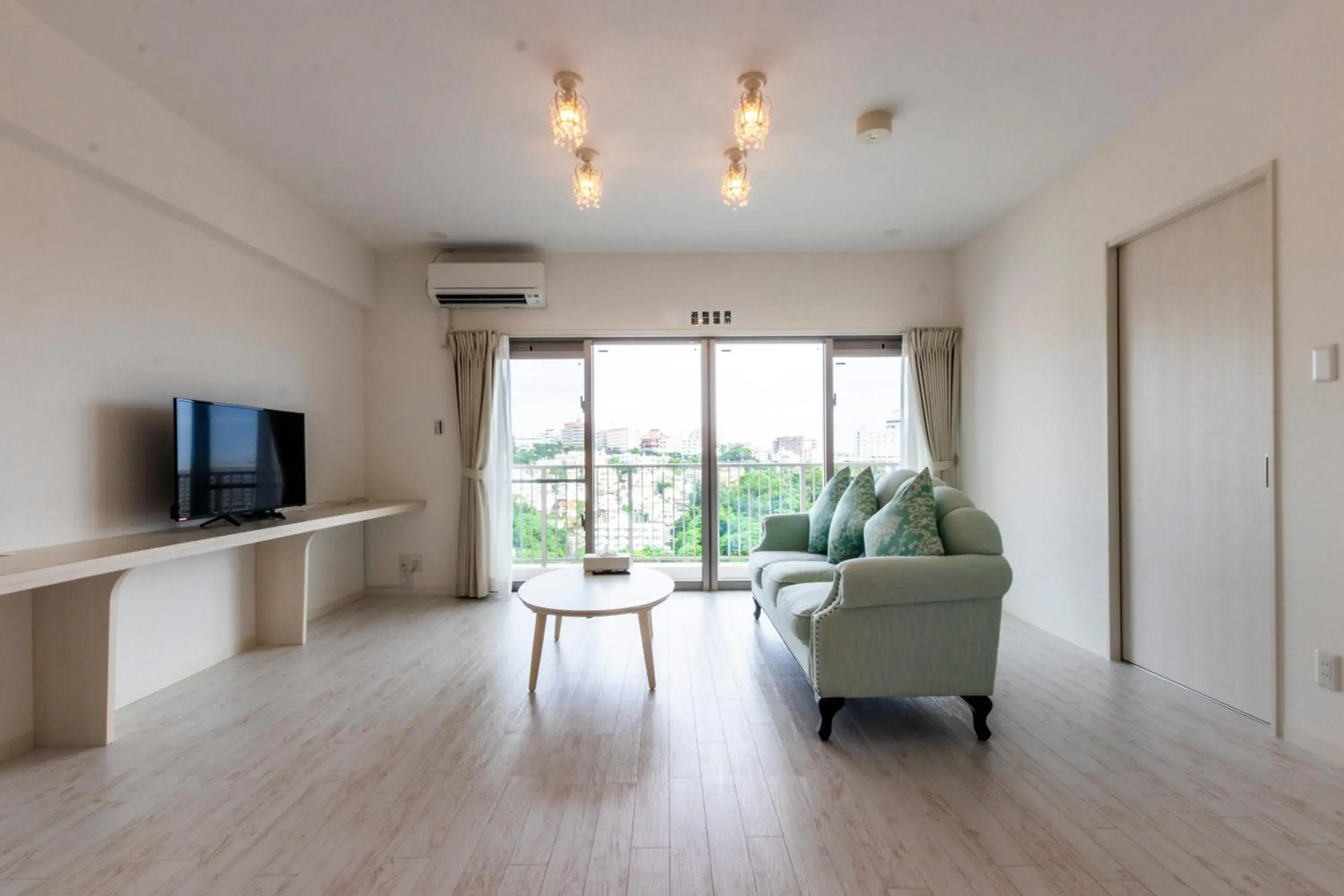 TV and multimedia, Seating Area in Cozy Stay in Naha