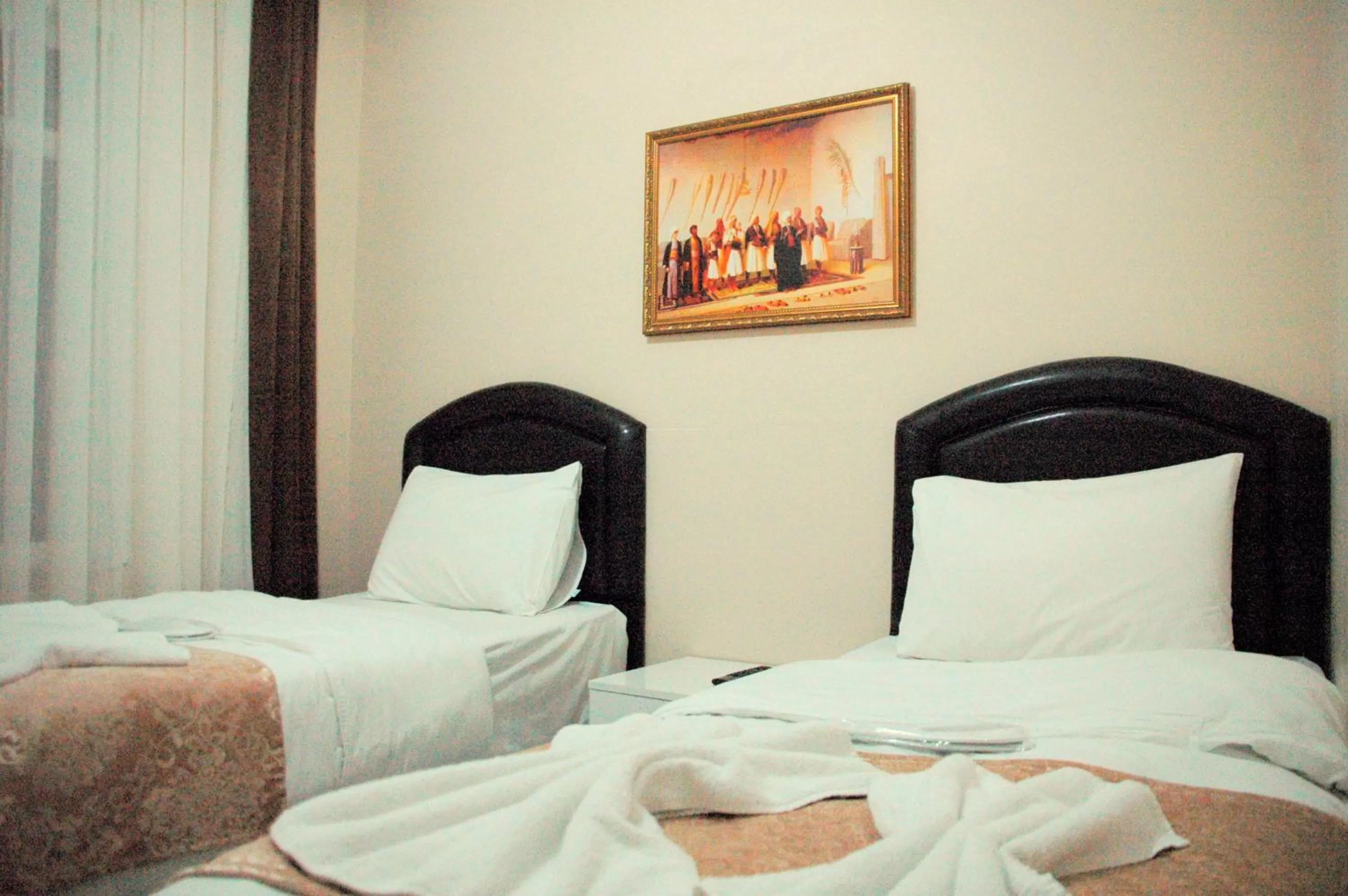 Photo of the whole room, Bed in Tolga Hotel