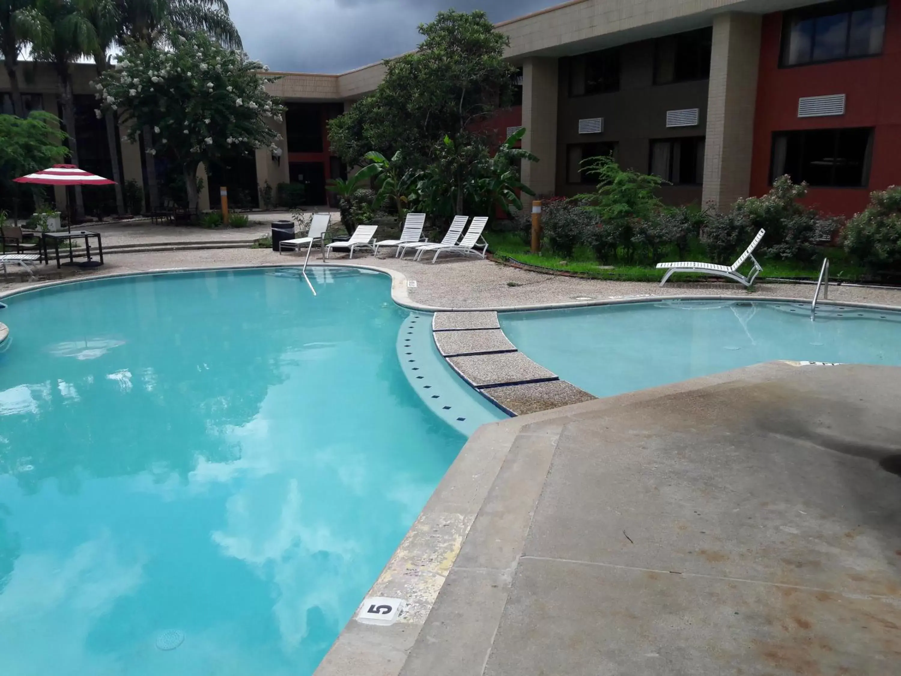 Swimming Pool in Americas Best Value Inn & Suites-Texas City/La Marque Swimming Pool in Americas Best Value Inn & Suites-Texas City/La Marque