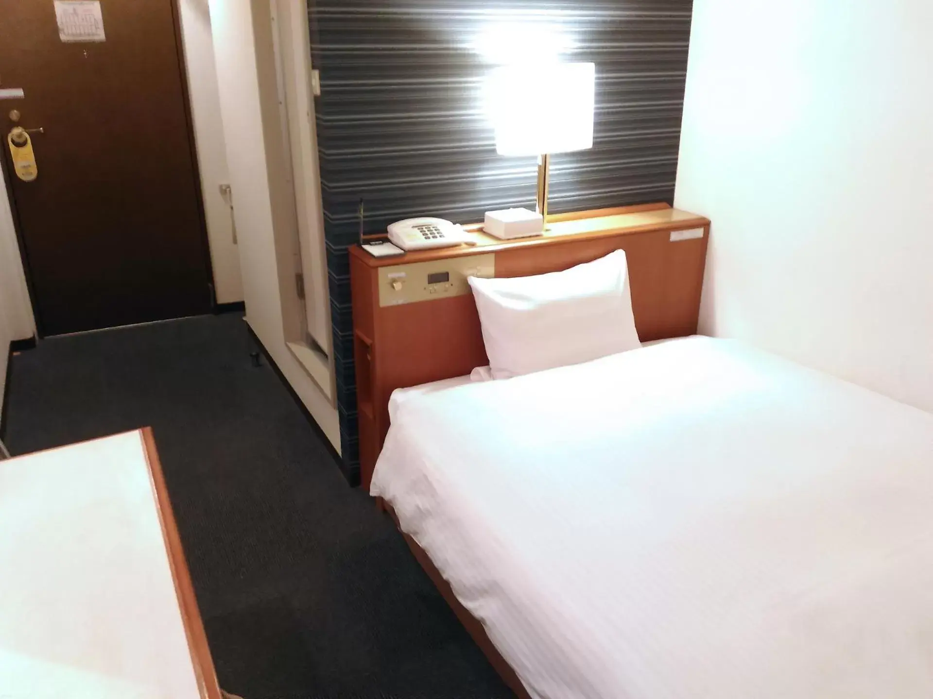 Bed in Smile Hotel Towada