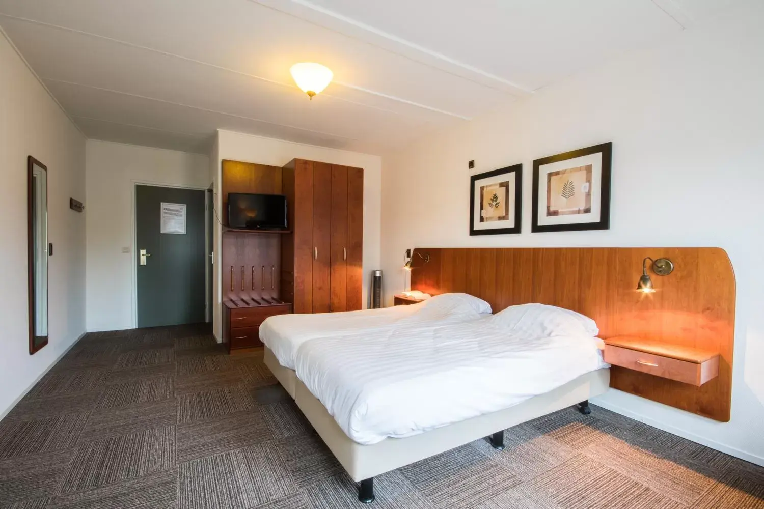 Bed in De Stobbe hotel & suites