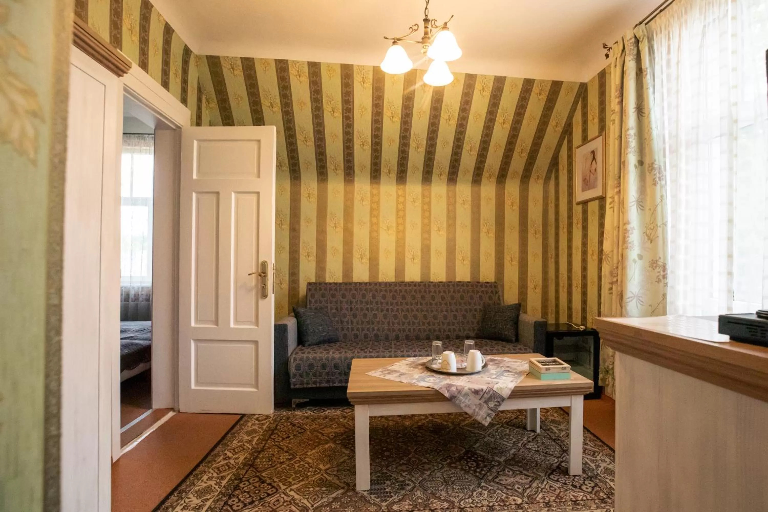 Seating area in City Center Kaķis B&B