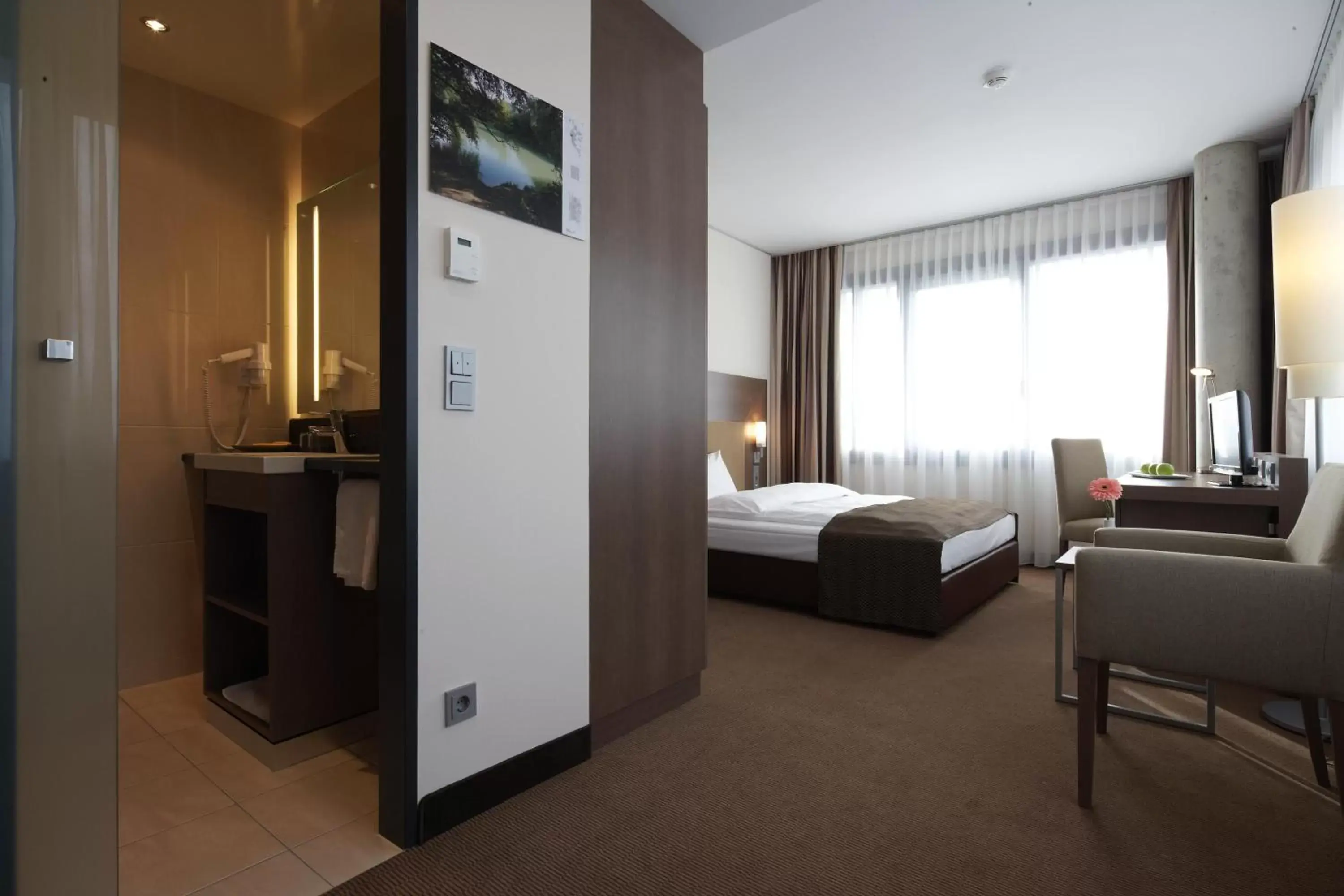 Photo of the whole room, Bed in IntercityHotel Mannheim
