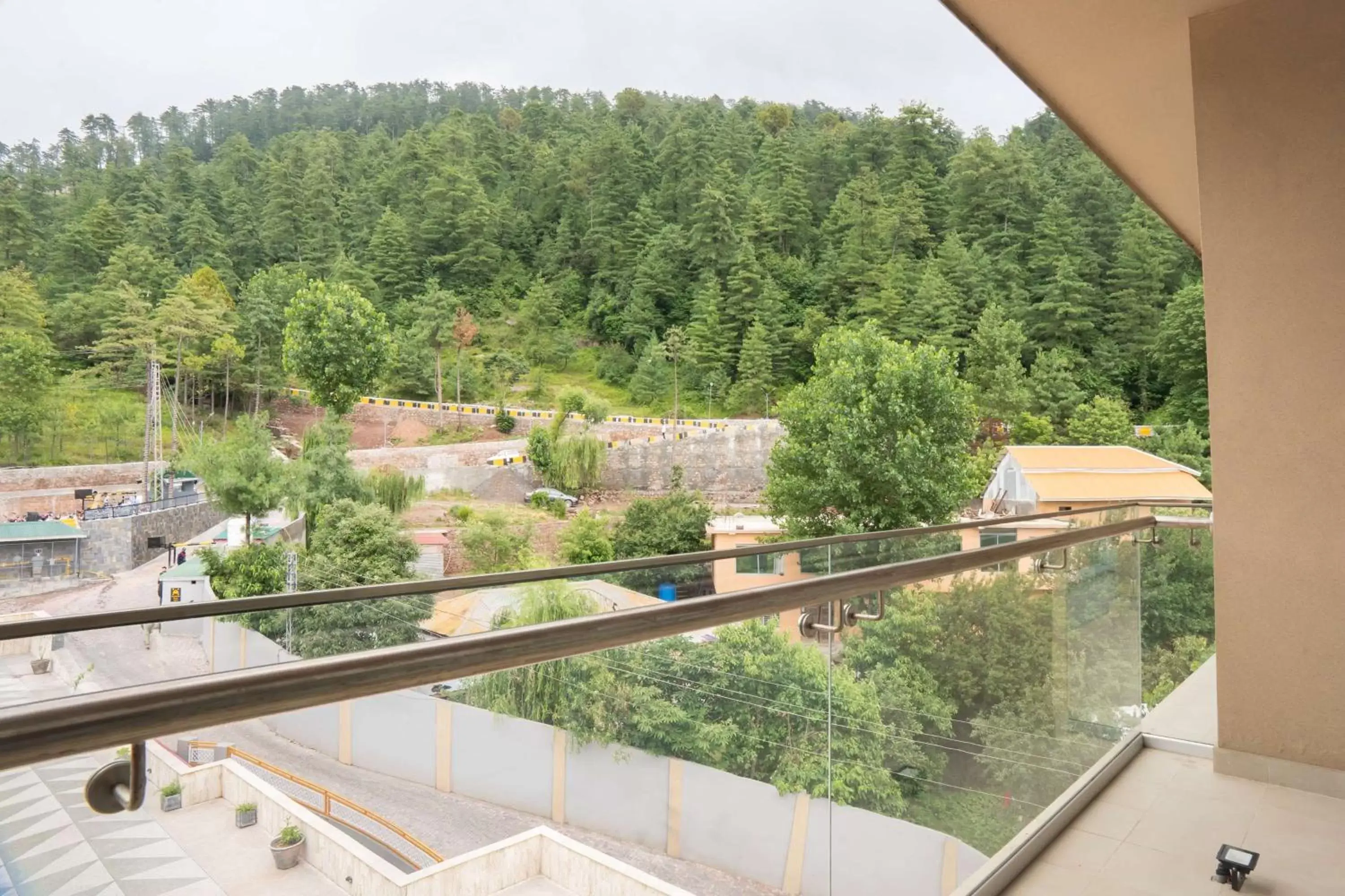 Photo of the whole room, Balcony/Terrace in Ramada by Wyndham Murree Lower Topa Resort