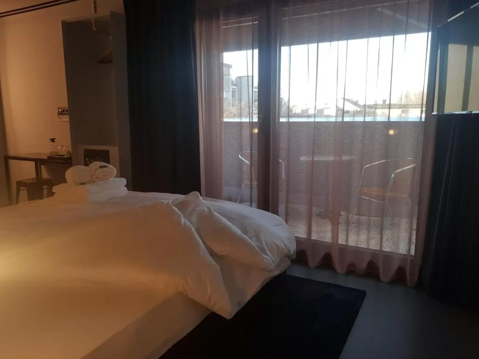Balcony/Terrace, Bed in BLOOM Boutique Hotel & Lounge Basel