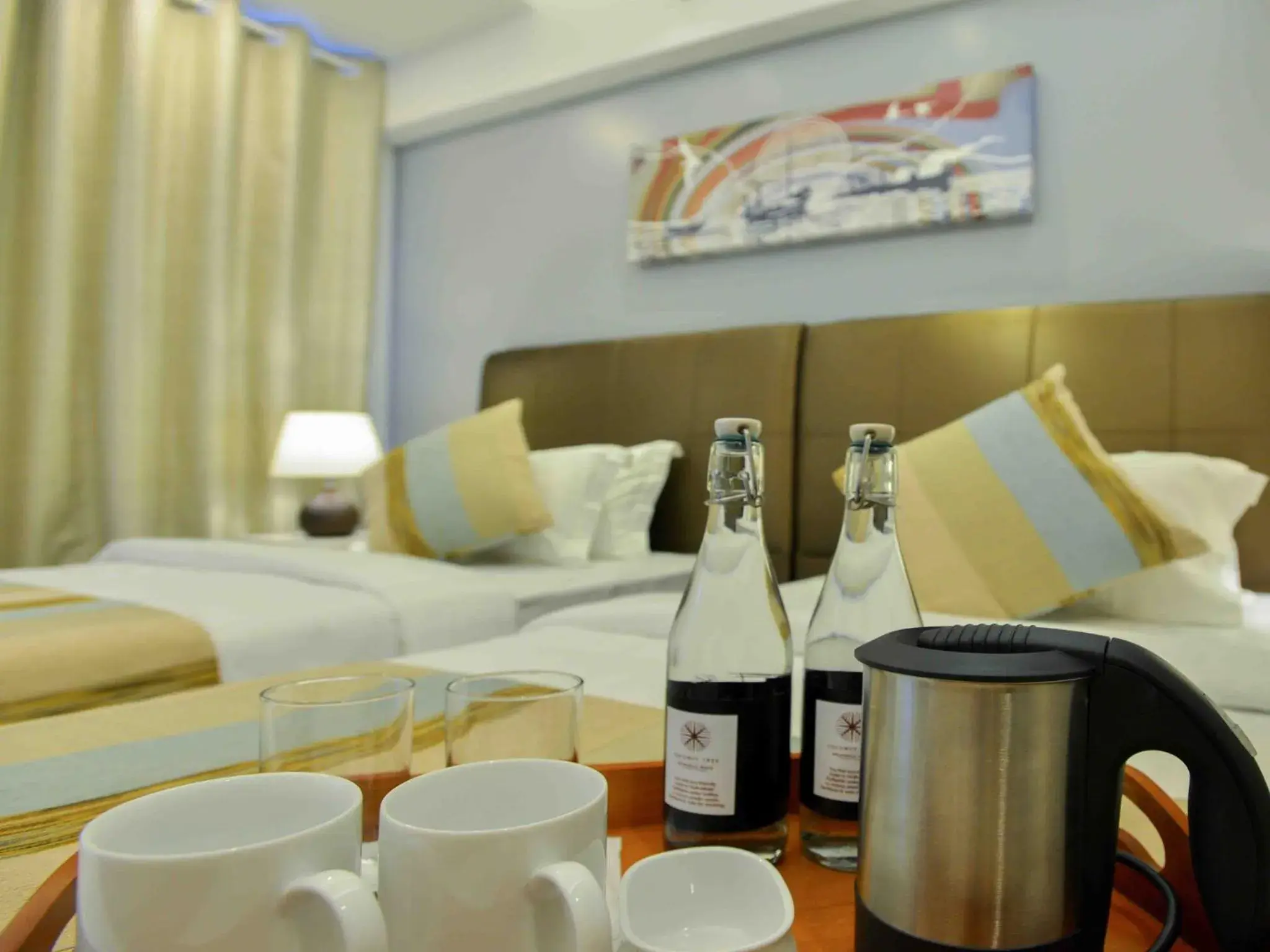 Coffee/tea facilities, Bed in Coconut Tree Hulhuvilla Beach Coffee/tea facilities, Bed in Coconut Tree Hulhuvilla Beach