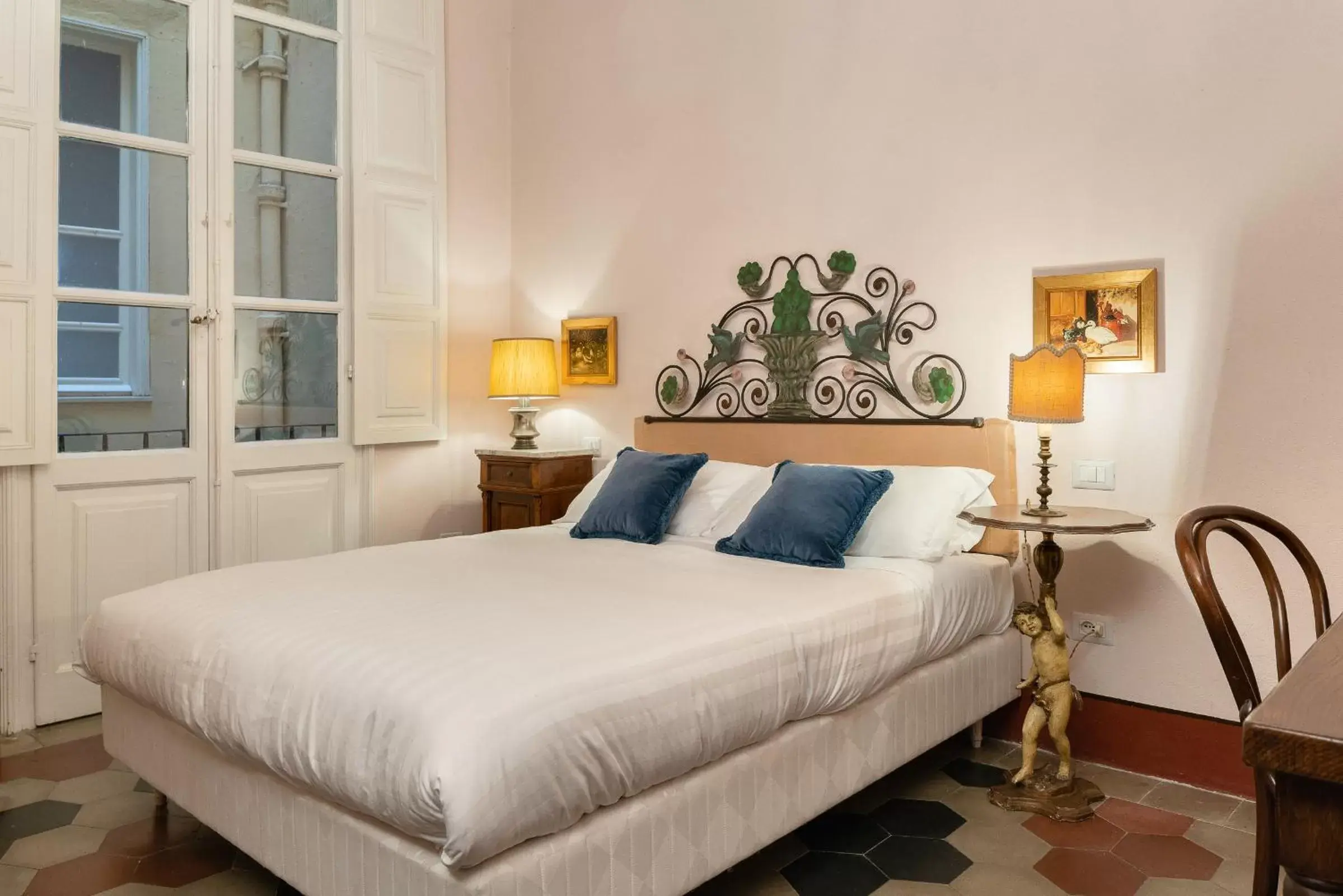 Bed in Bellezza Suites