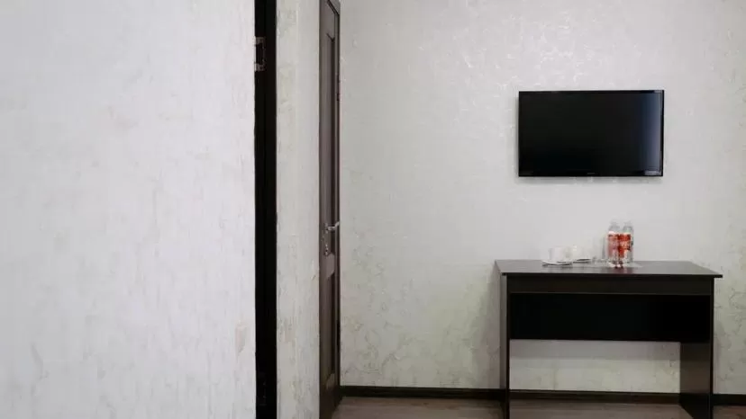 Communal lounge/ TV room in Rush Hotel