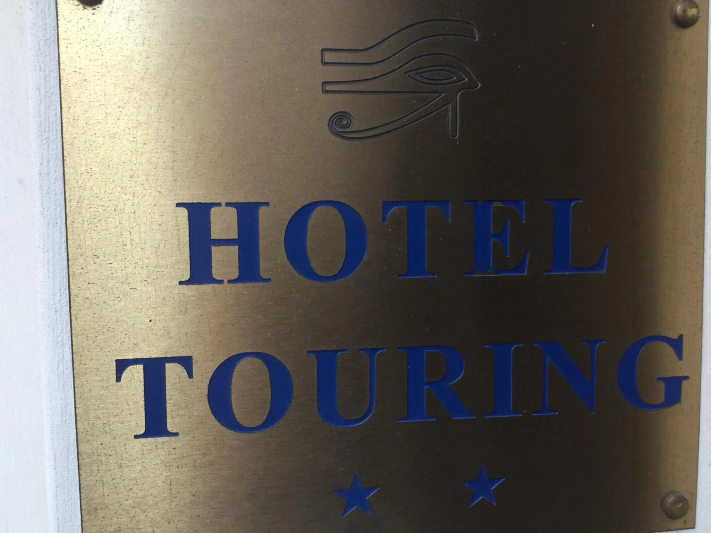Property logo or sign in Hotel Touring