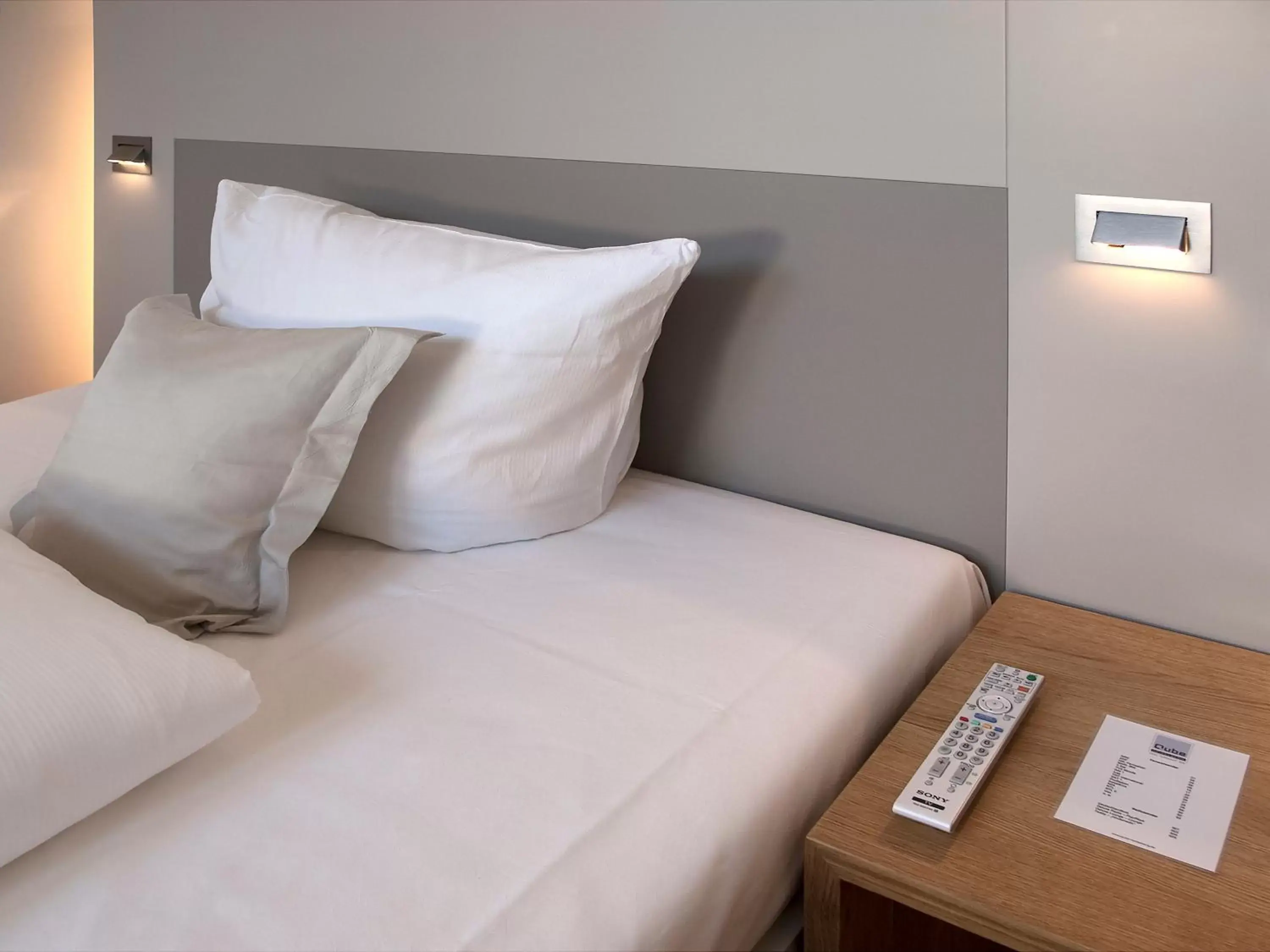 Bed in Qube Hotel Bergheim