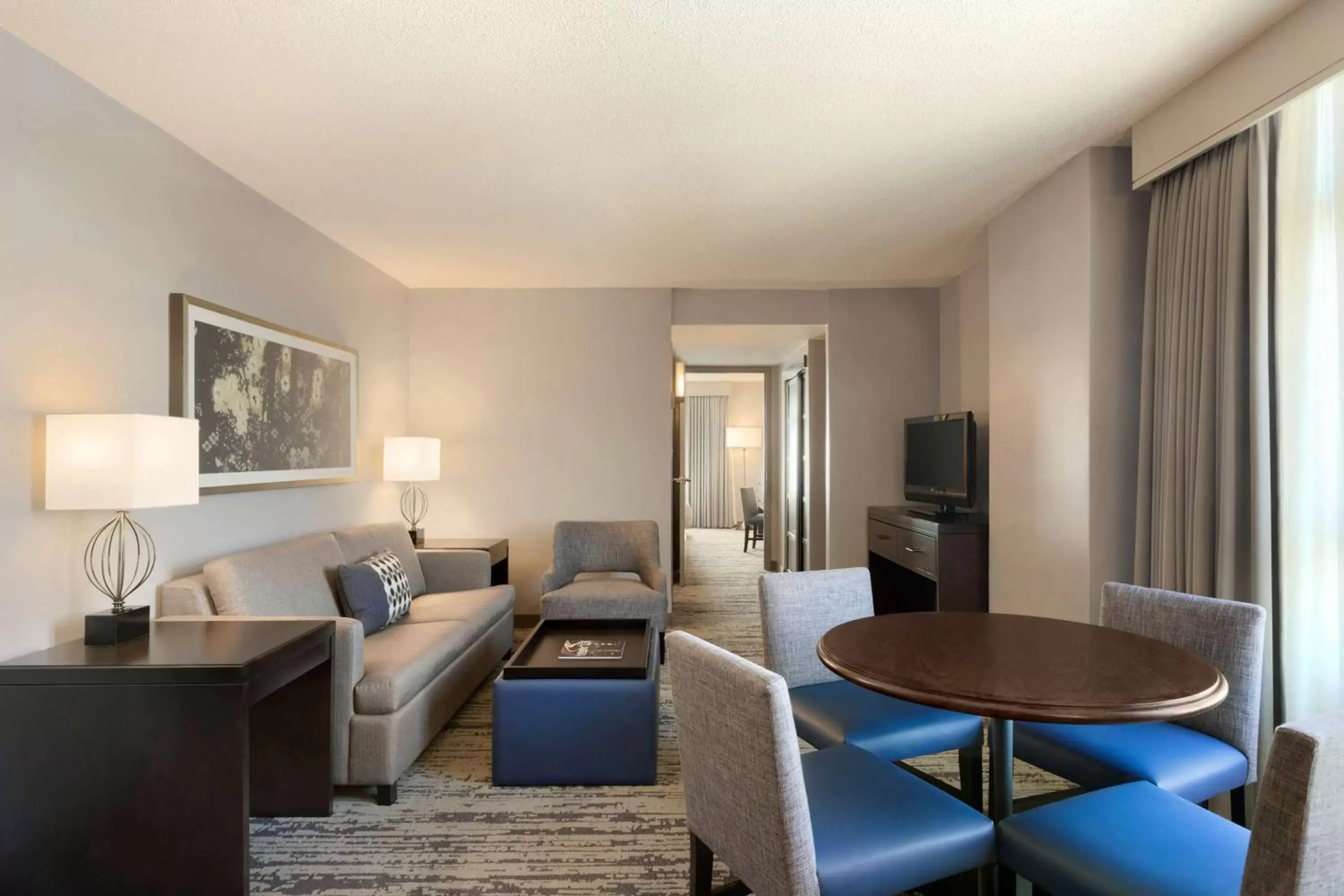Living room, Seating Area in Embassy Suites by Hilton Atlanta at Centennial Olympic Park
