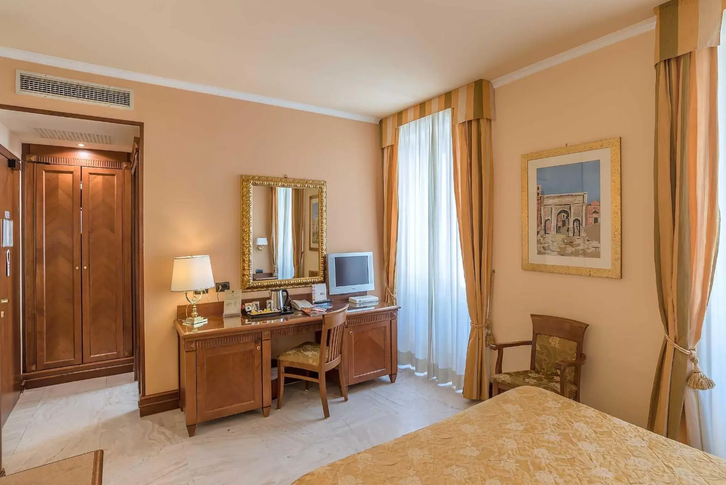 Photo of the whole room, TV/Entertainment Center in Tmark Hotel Vaticano