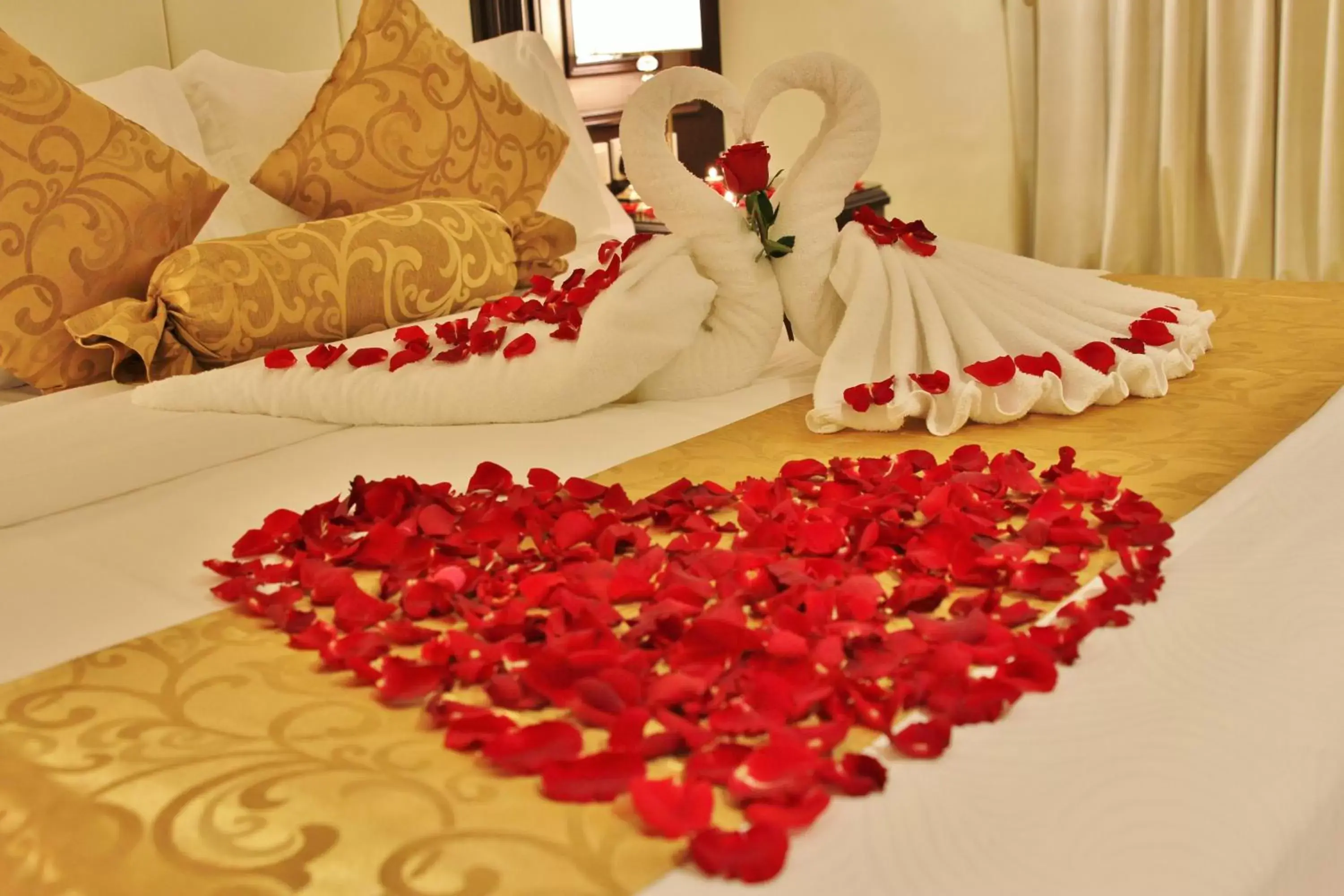 Bed in Carawan Al Fahad Hotel