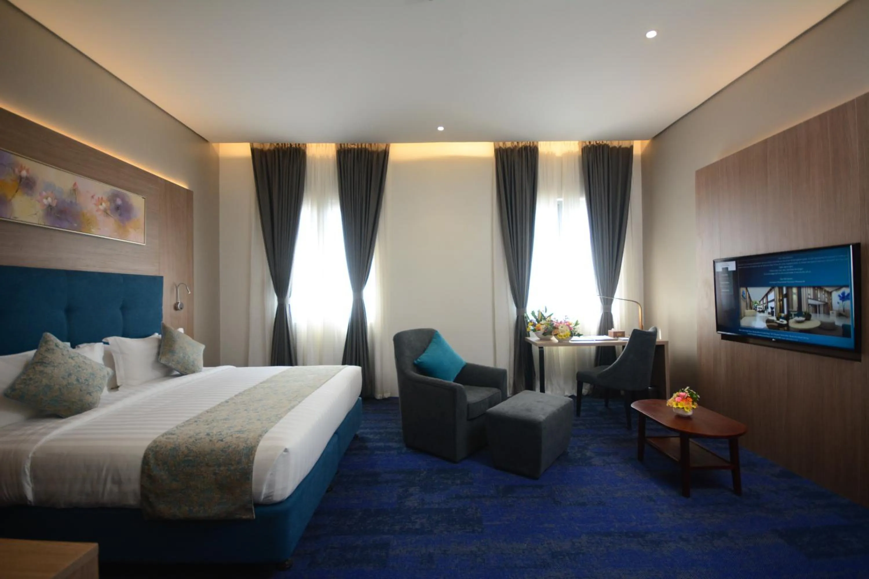 TV and multimedia, Bed in Blue Lotus Hotel