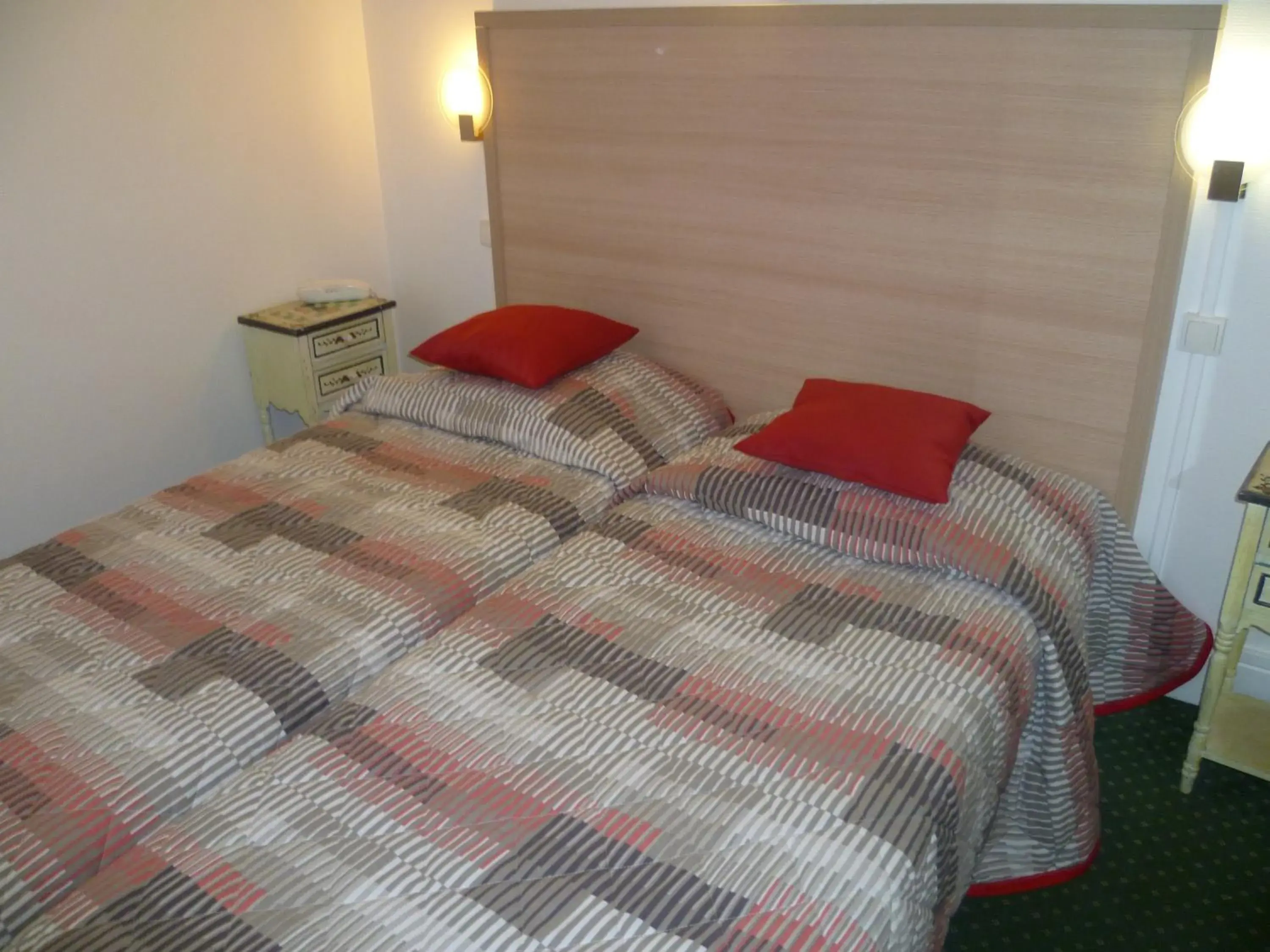 Bed in Hôtel Beauséjour