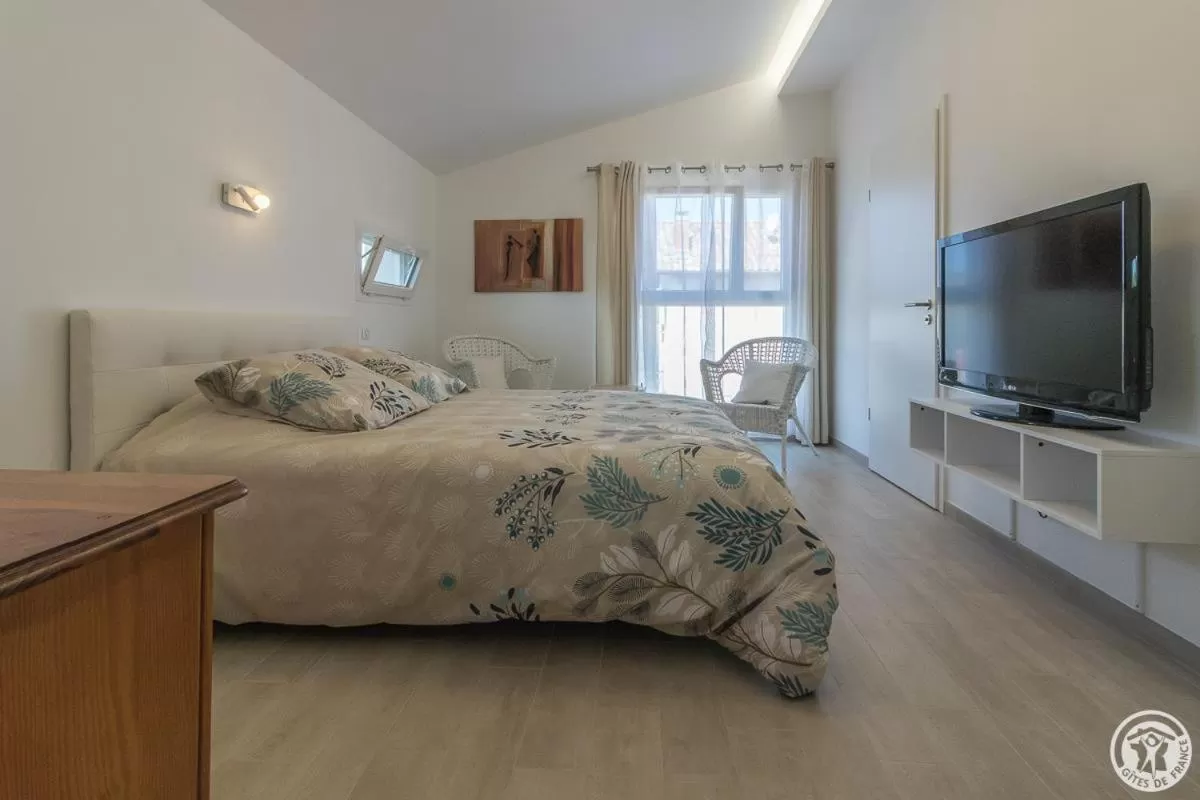 Bed in COSY LODGE TOULOUSE