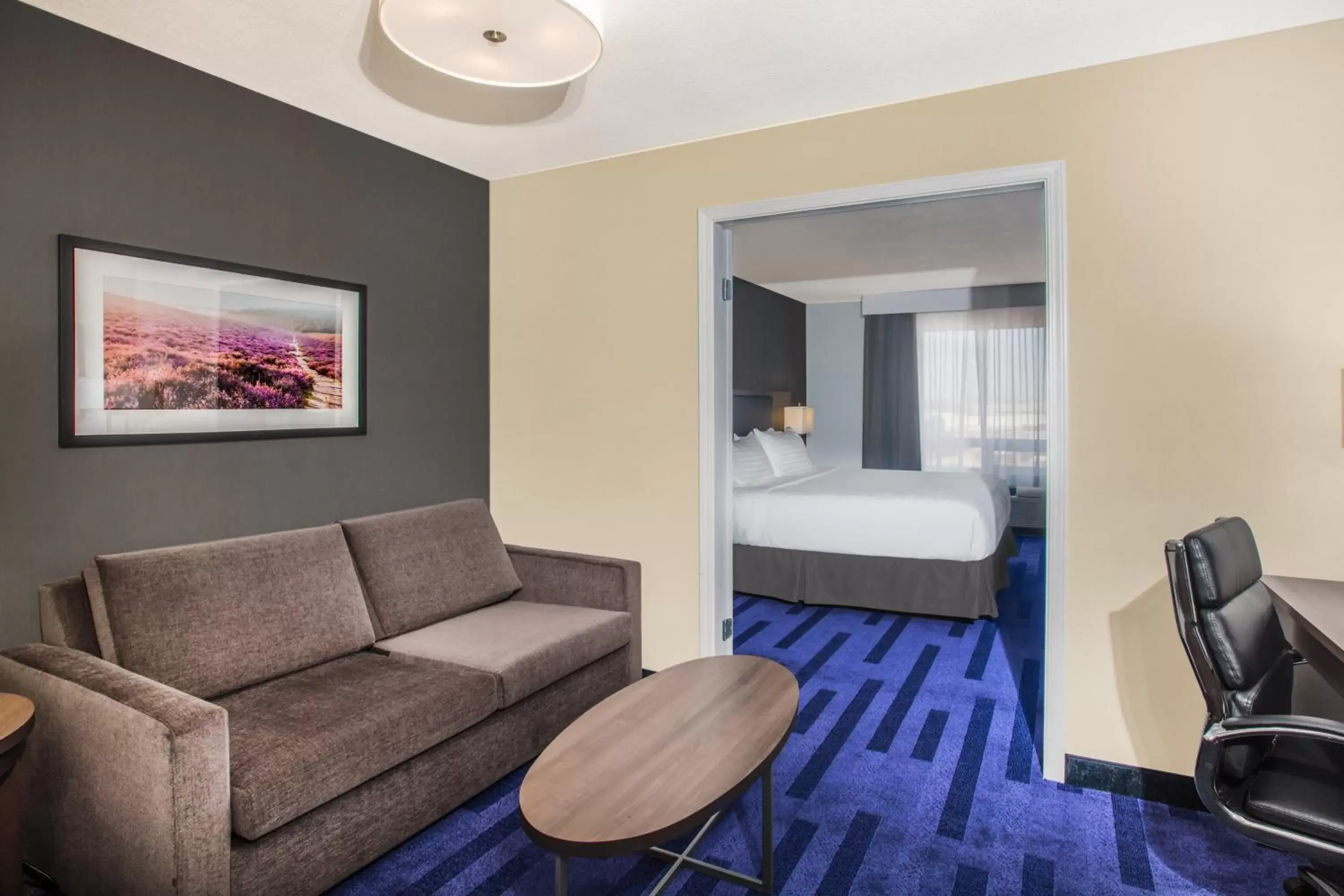 Photo of the whole room, Seating Area in Holiday Inn & Suites Grande Prairie, an IHG Hotel