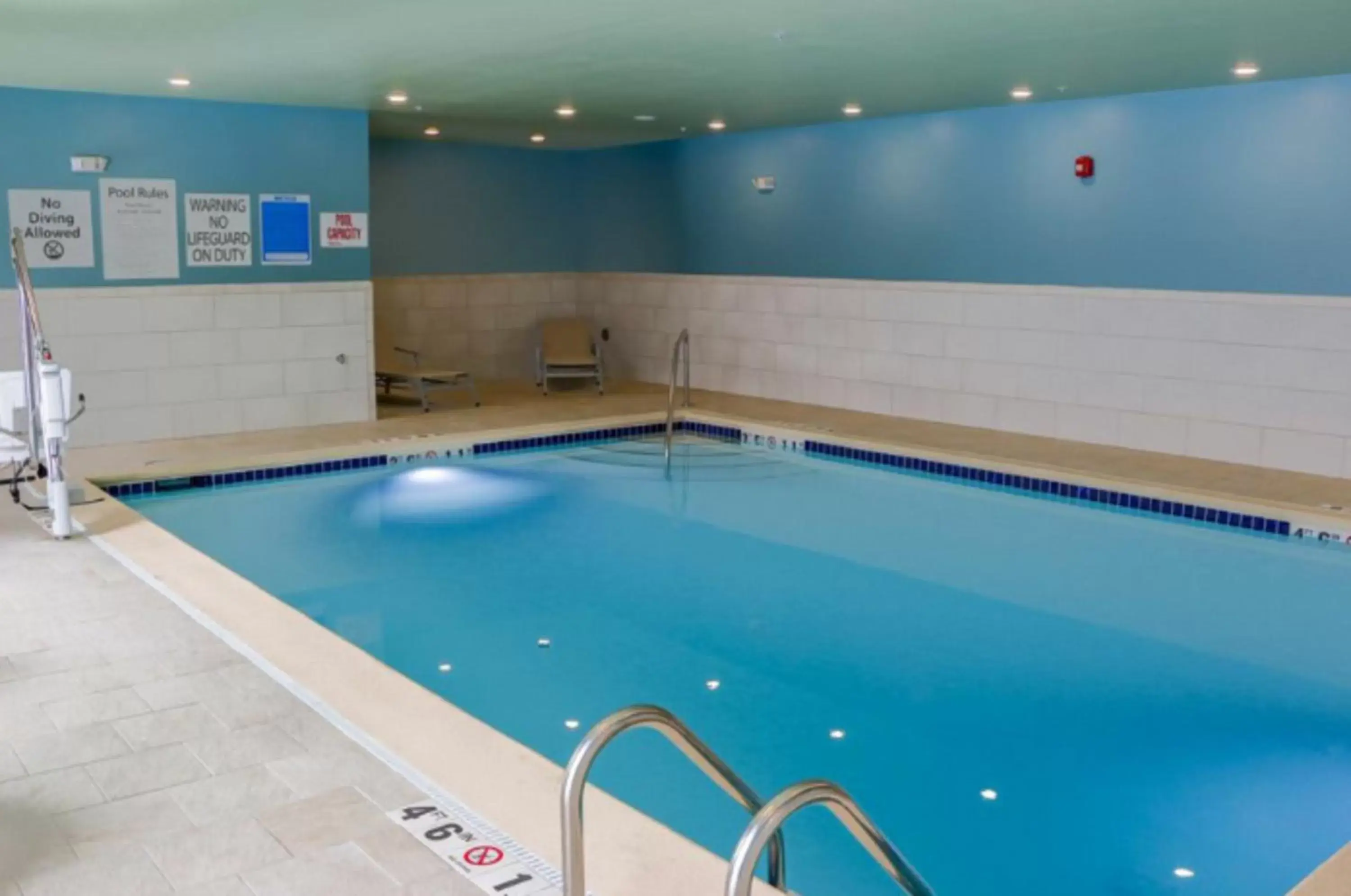 Swimming Pool in Holiday Inn Express & Suites - Detroit North - Roseville, an IHG Hotel