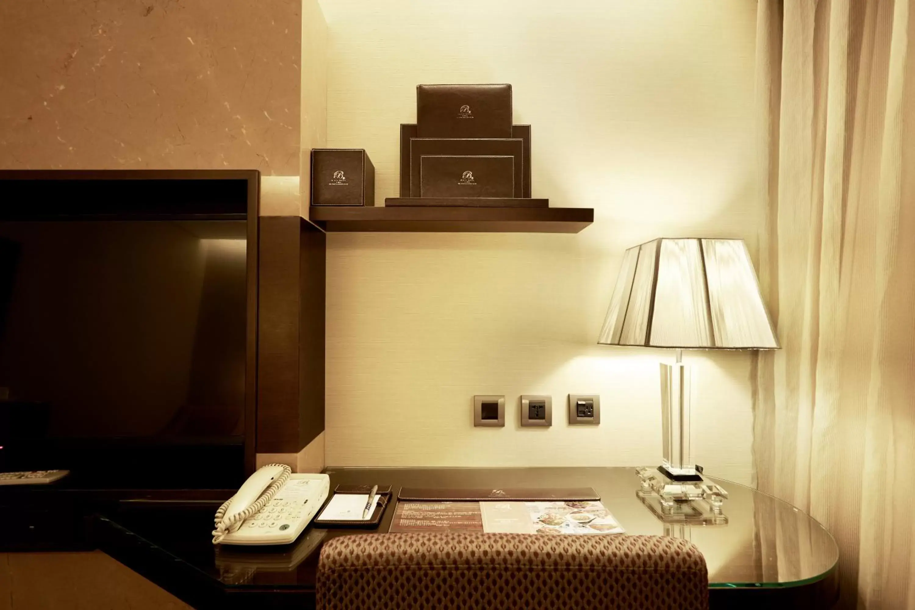 Bedroom, TV/Entertainment Center in Beauty Hotels - Roumei Boutique