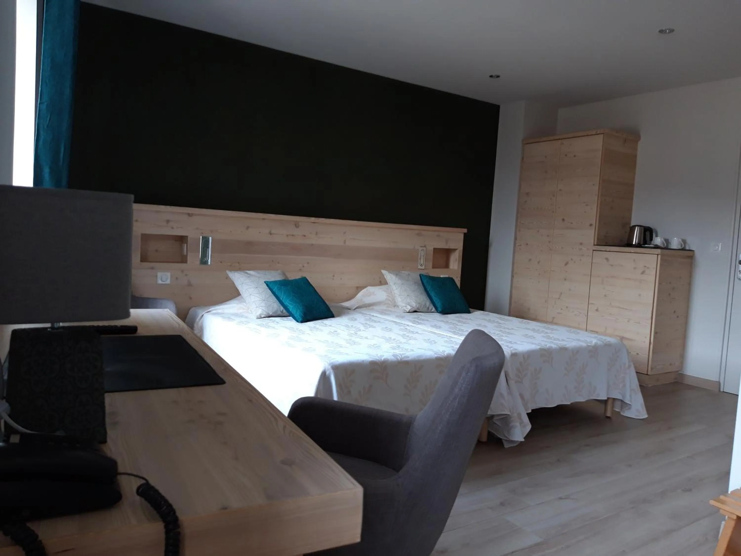 Bed in Hôtel la Guimbarde