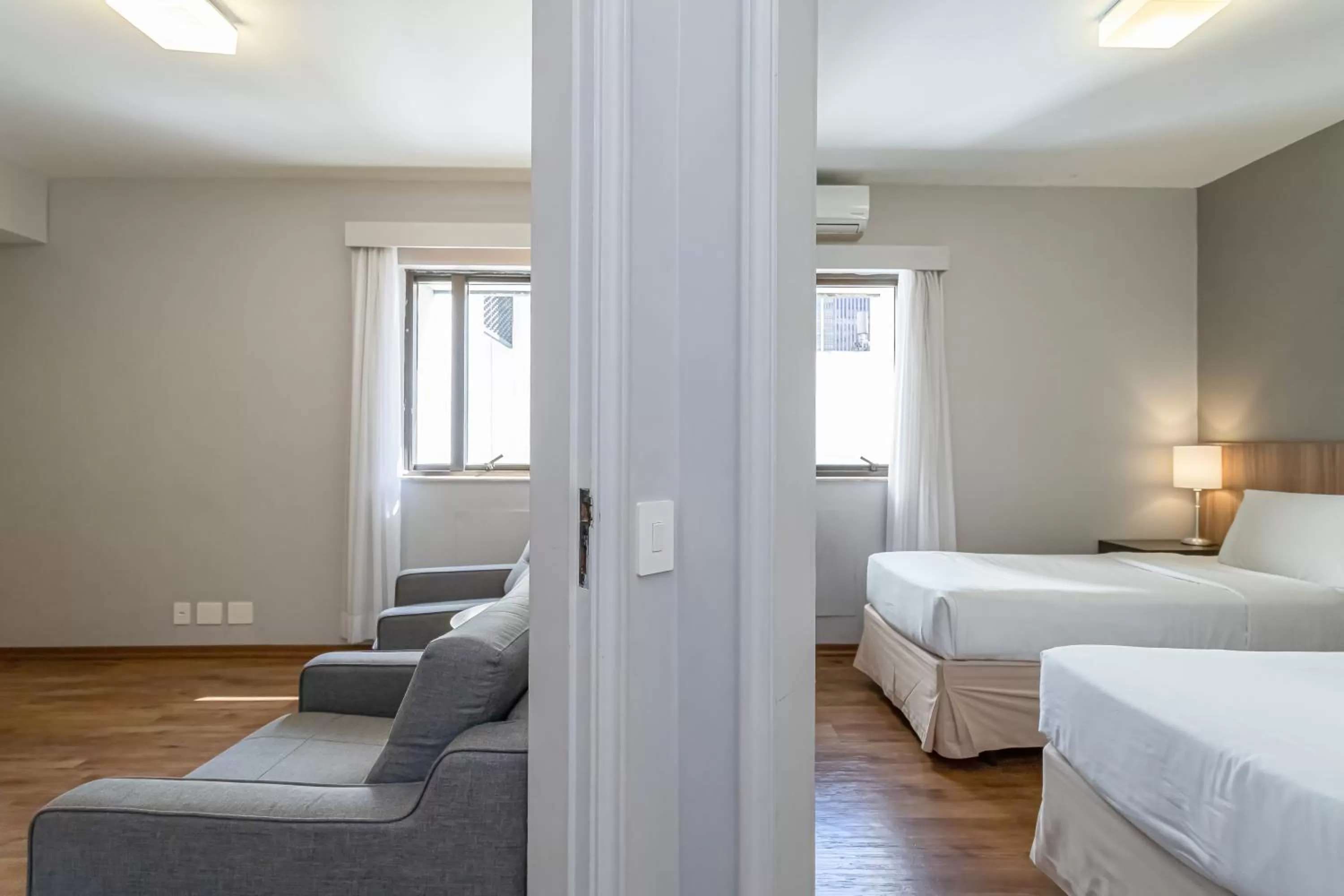 Living room, Bed in H4 La Residence Paulista