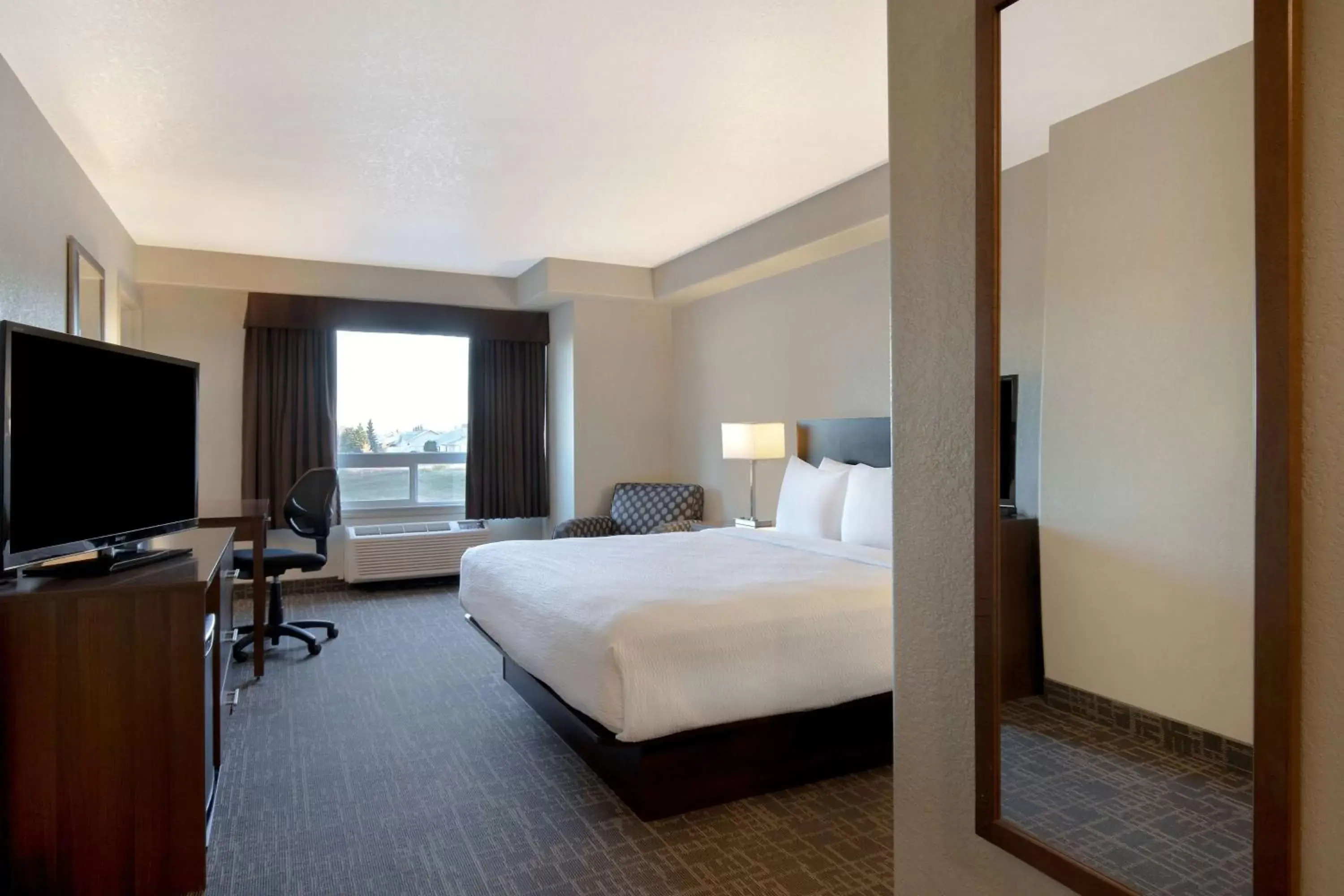 Photo of the whole room, Bed in Days Inn & Suites by Wyndham Yorkton