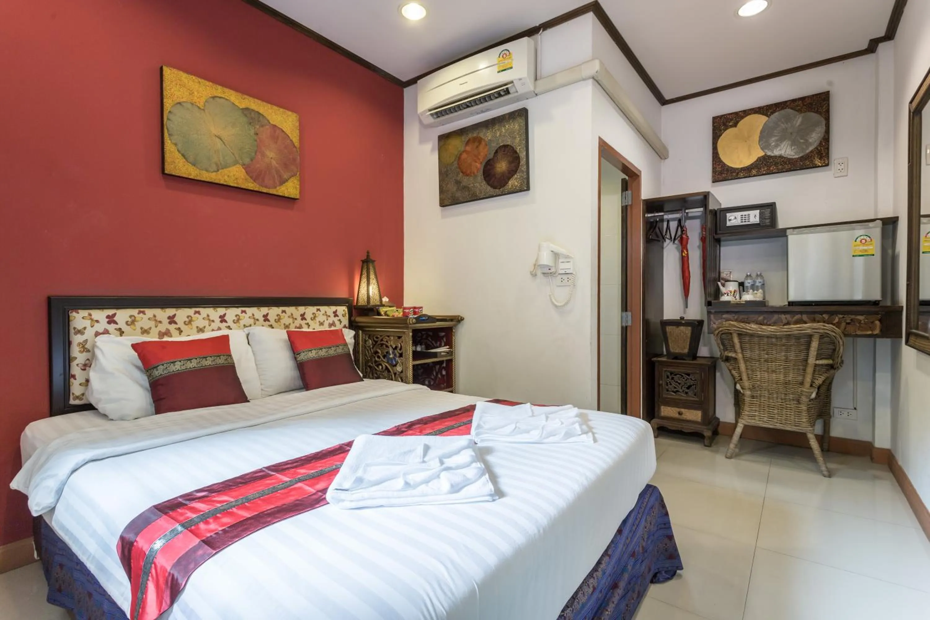 Bed in PloyKhumThong Boutique Resort