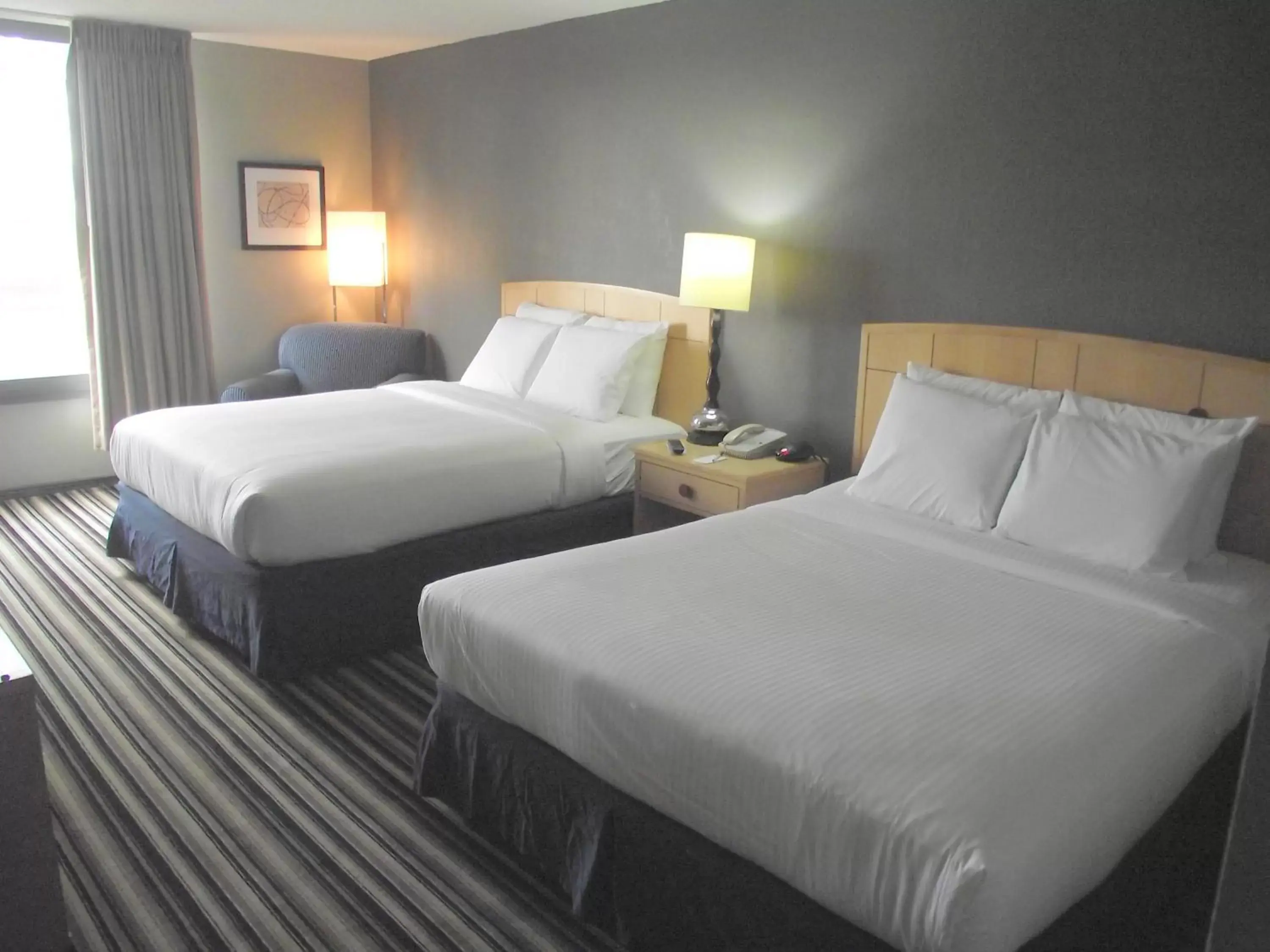Bedroom, Bed in Travelodge by Wyndham Memphis Airport/Graceland