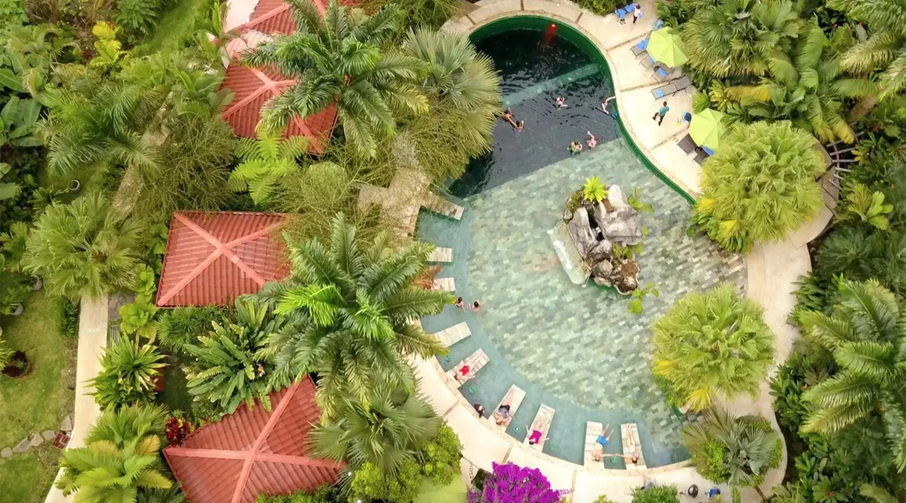 Swimming pool, Bird's-eye View in La Fortuna Lodge by Treebu Hotels