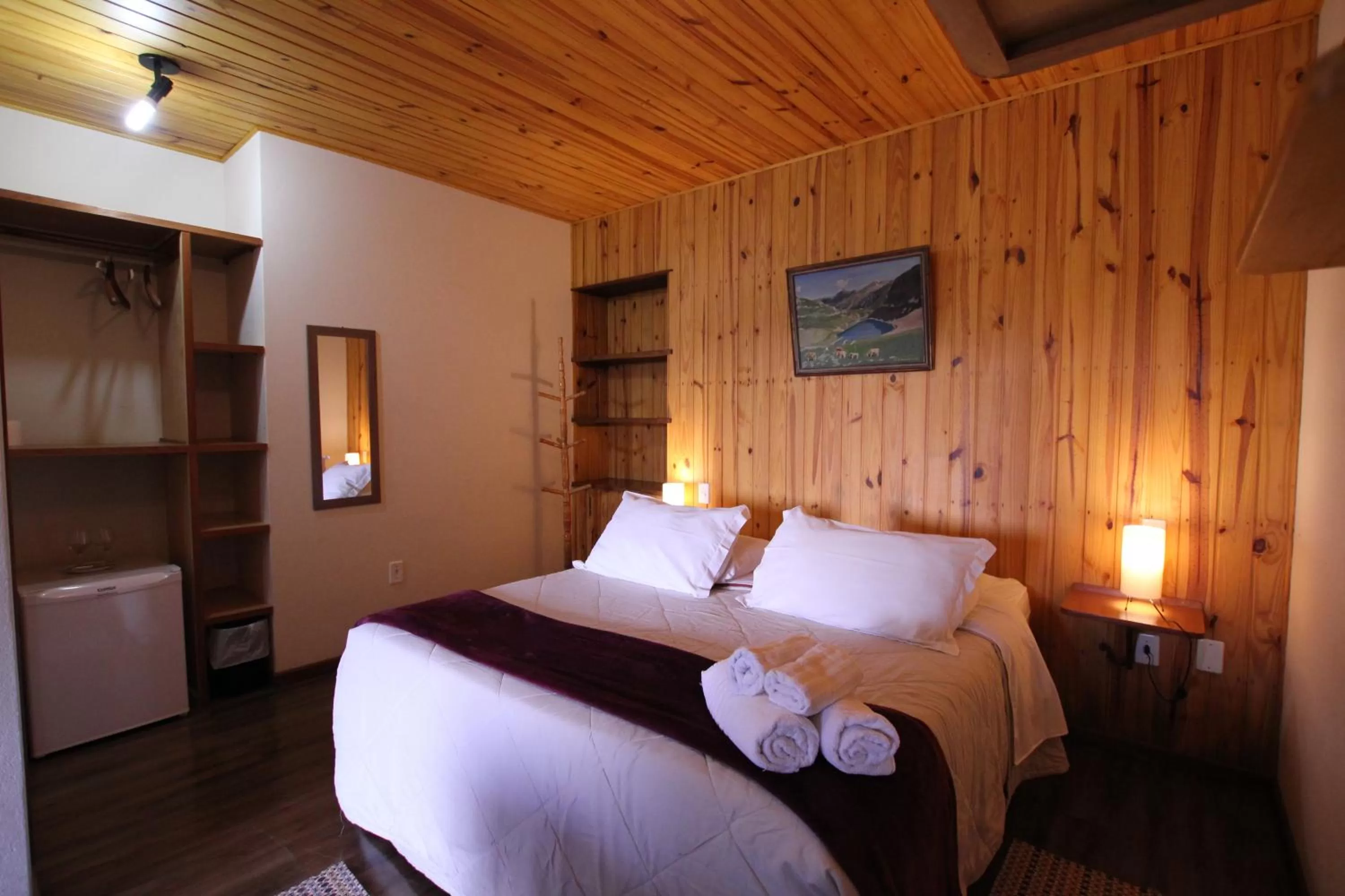 Bed in Pousada Aguia da Montanha