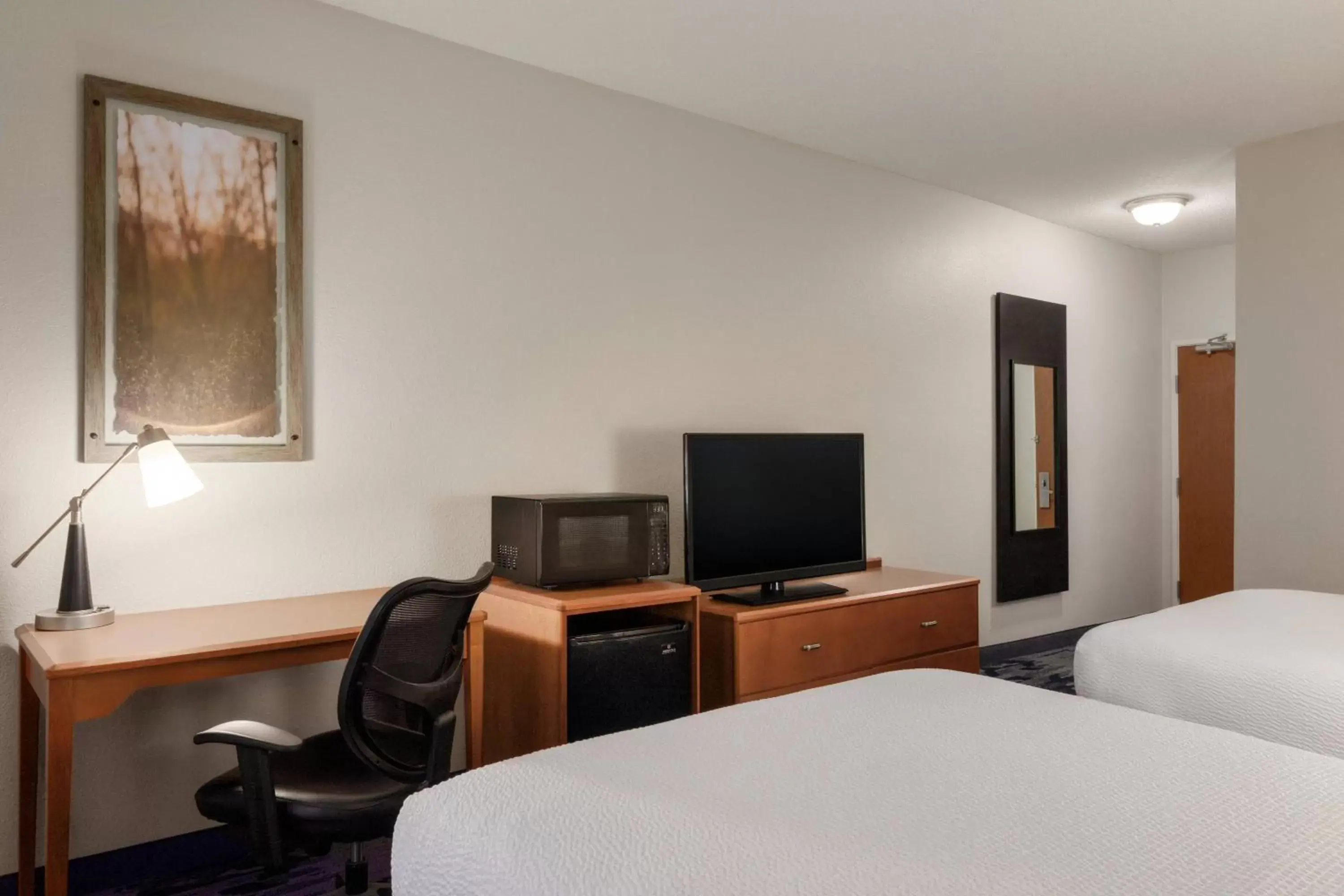 Photo of the whole room, TV/Entertainment Center in Fairfield Inn & Suites Stillwater