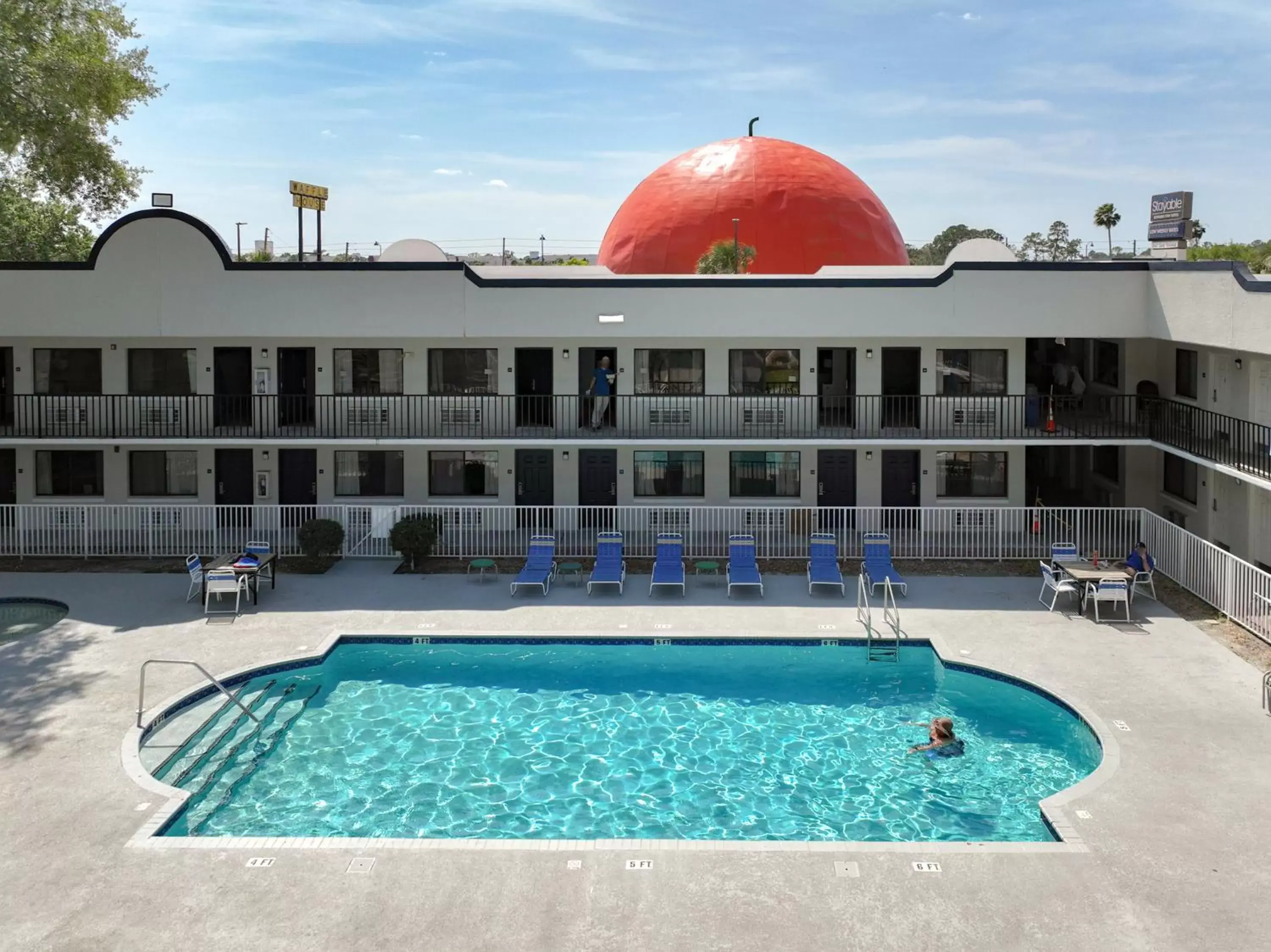 Property building, Swimming Pool in Stayable Suites Kissimmee West