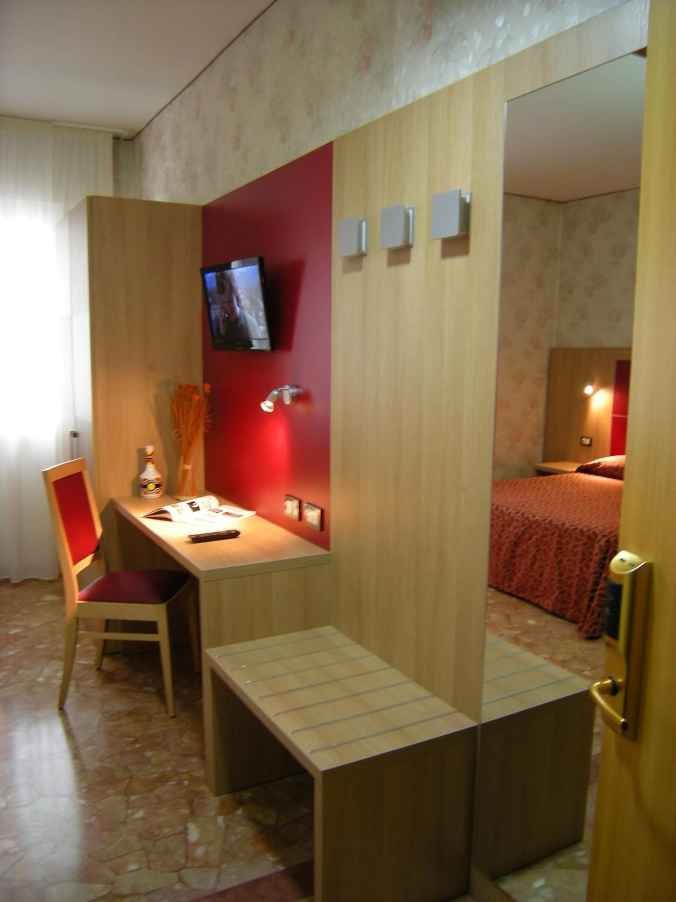 Seating area, Bed in Hotel San Carlo
