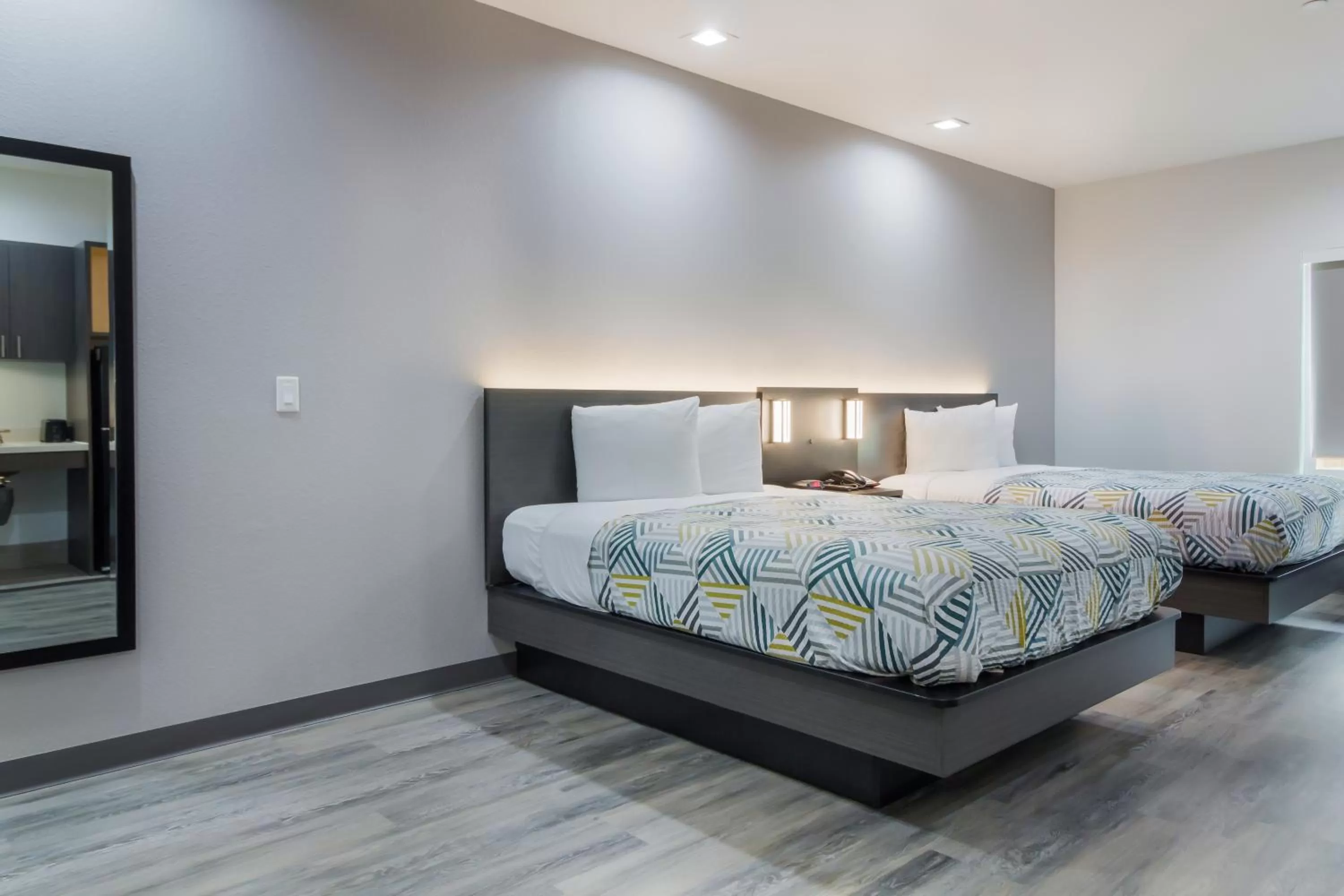 Bed in Studio 6 Katy, Tx