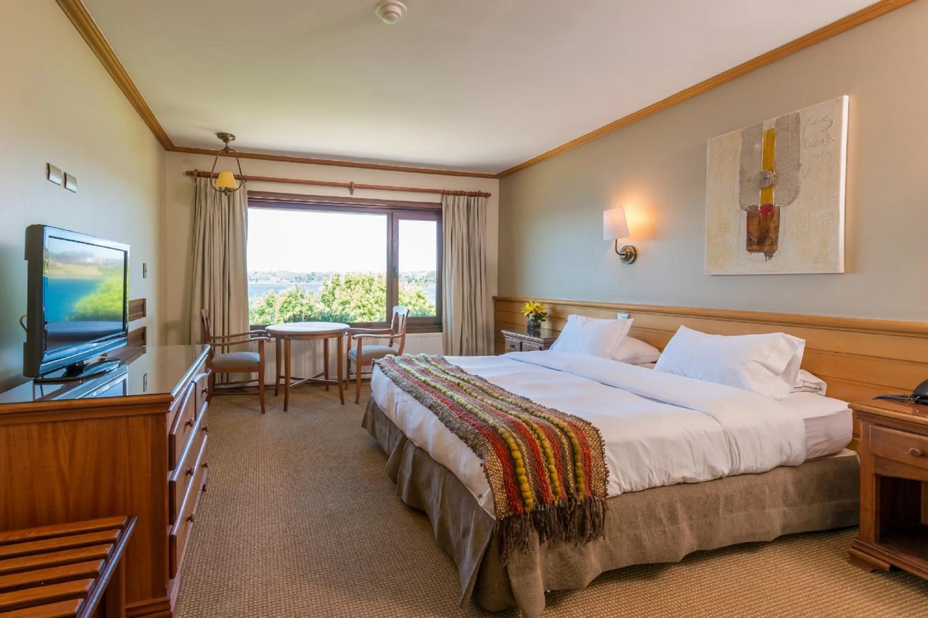 Photo of the whole room, Bed in Hotel Cabaña Del Lago Puerto Varas