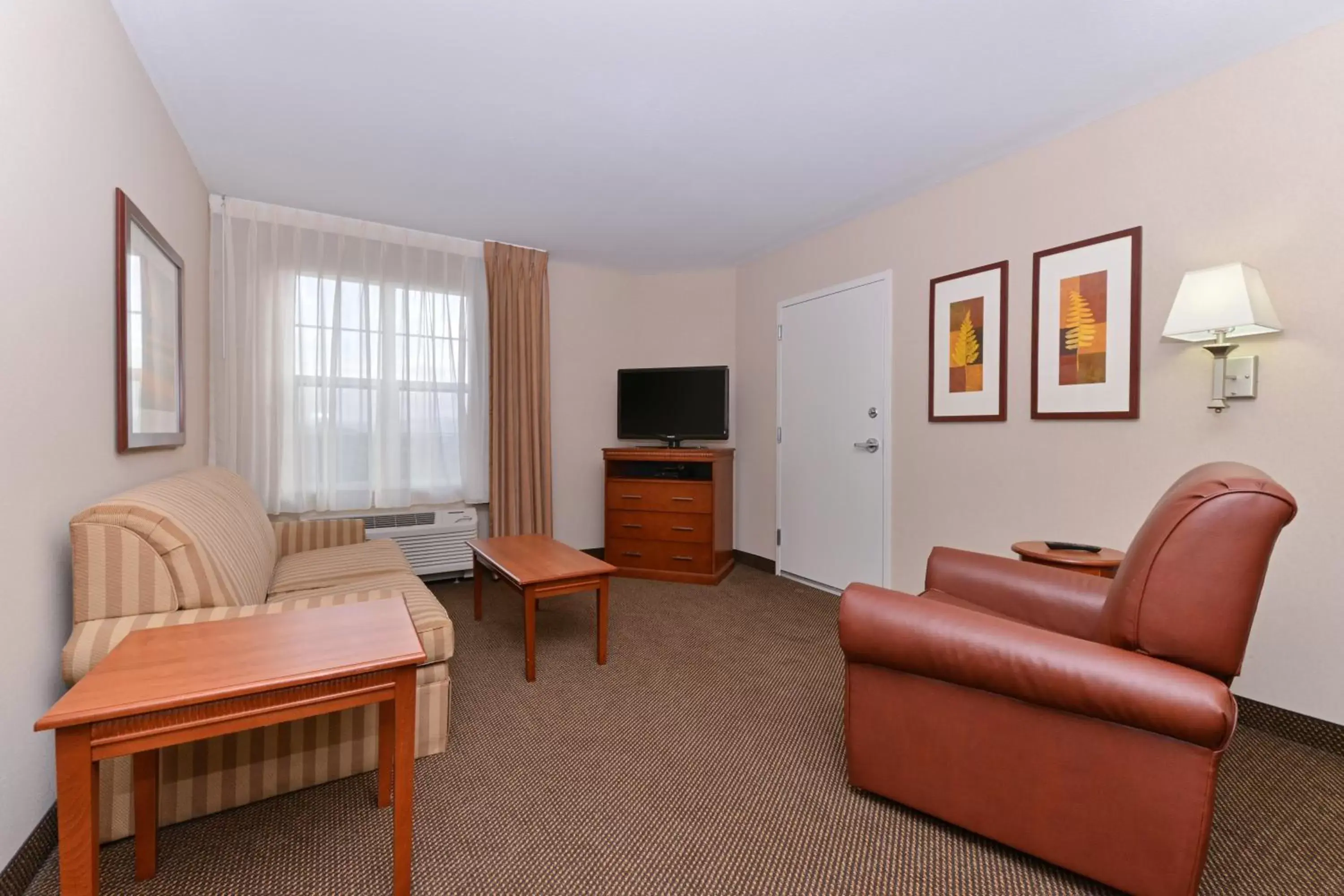 Bedroom, Seating Area in Candlewood Suites Elmira Horseheads, an IHG Hotel