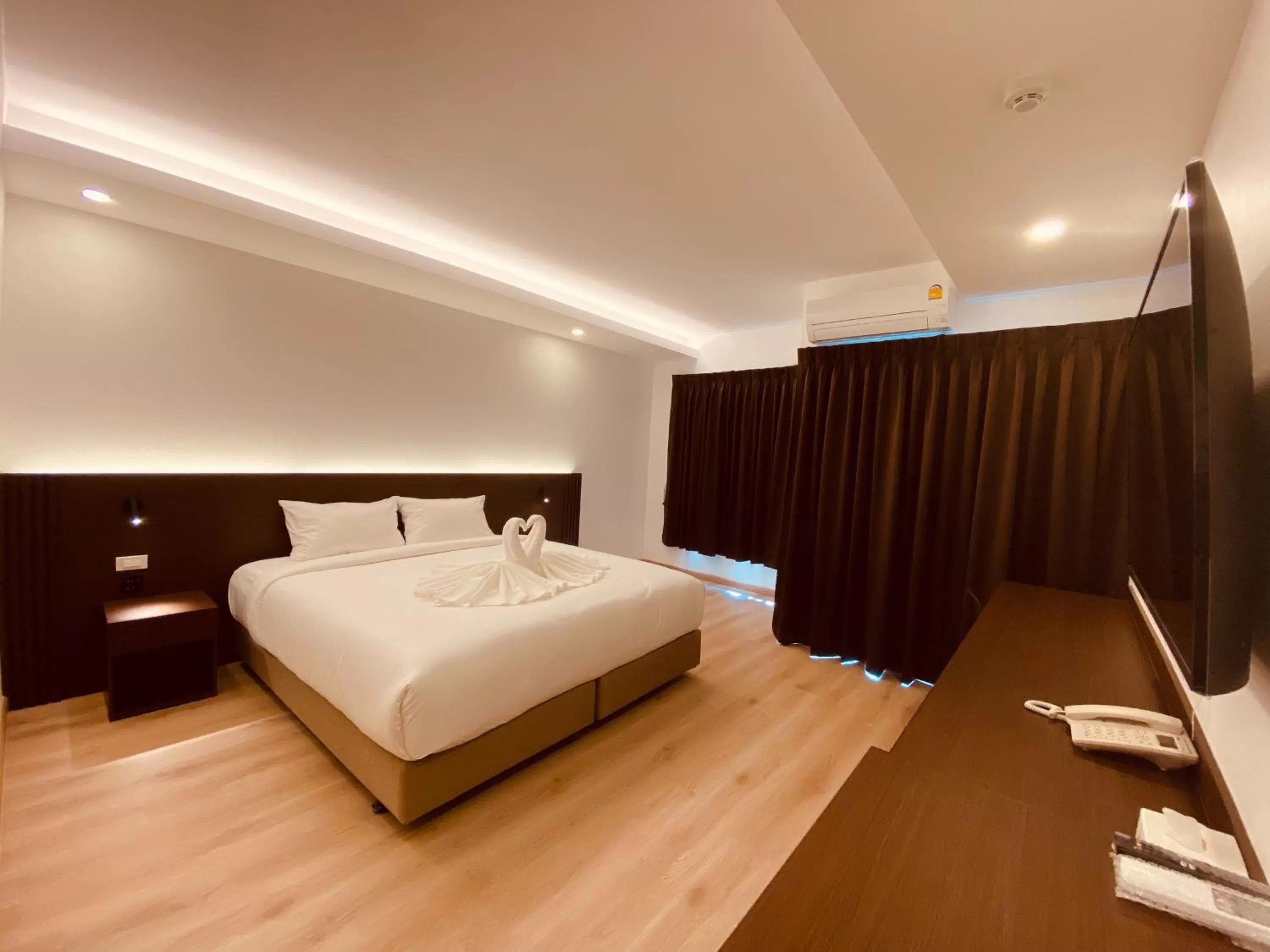 Bed in GEEN Hotel Chonburi