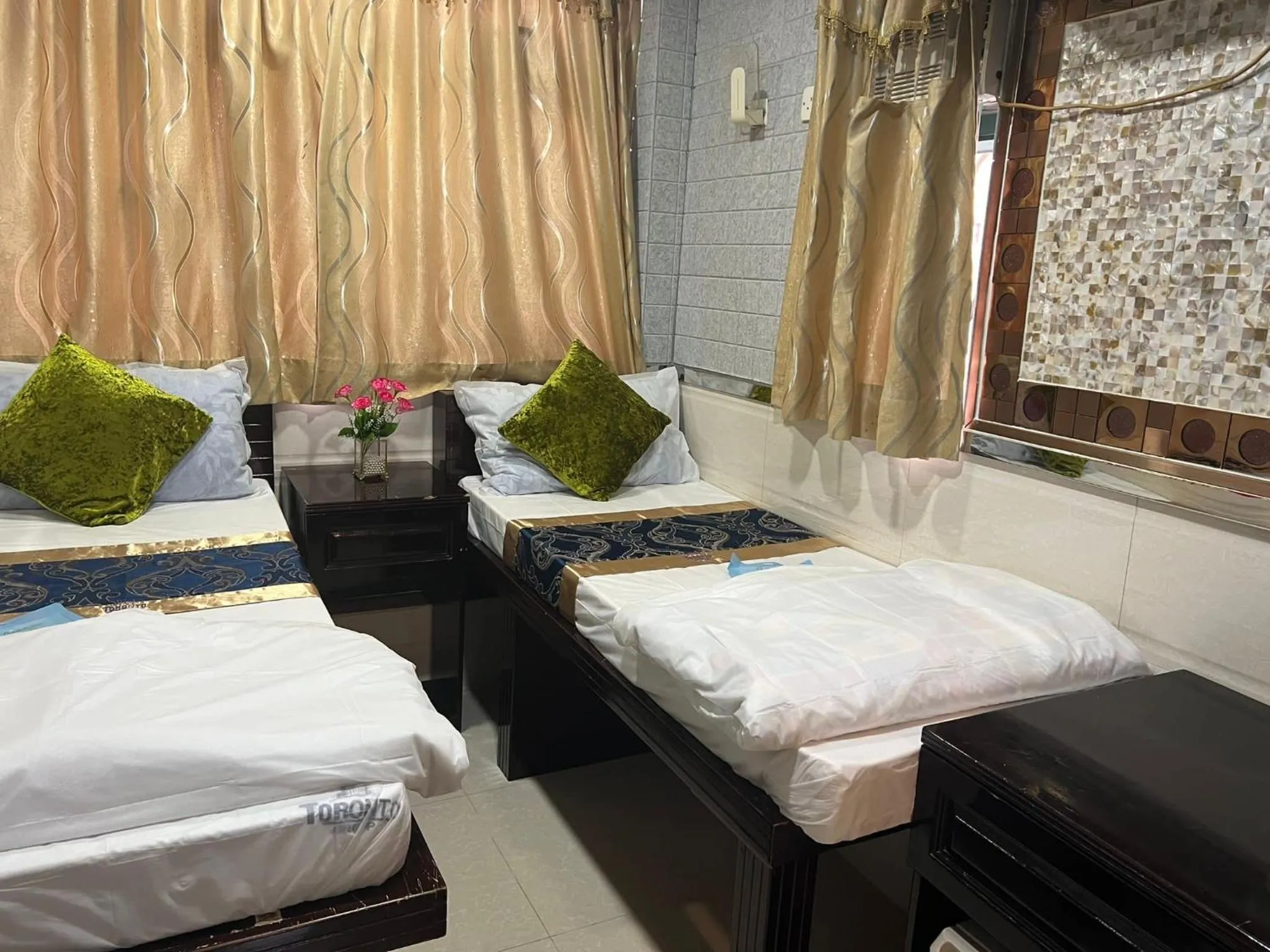 Bed in Temple Street Hotel