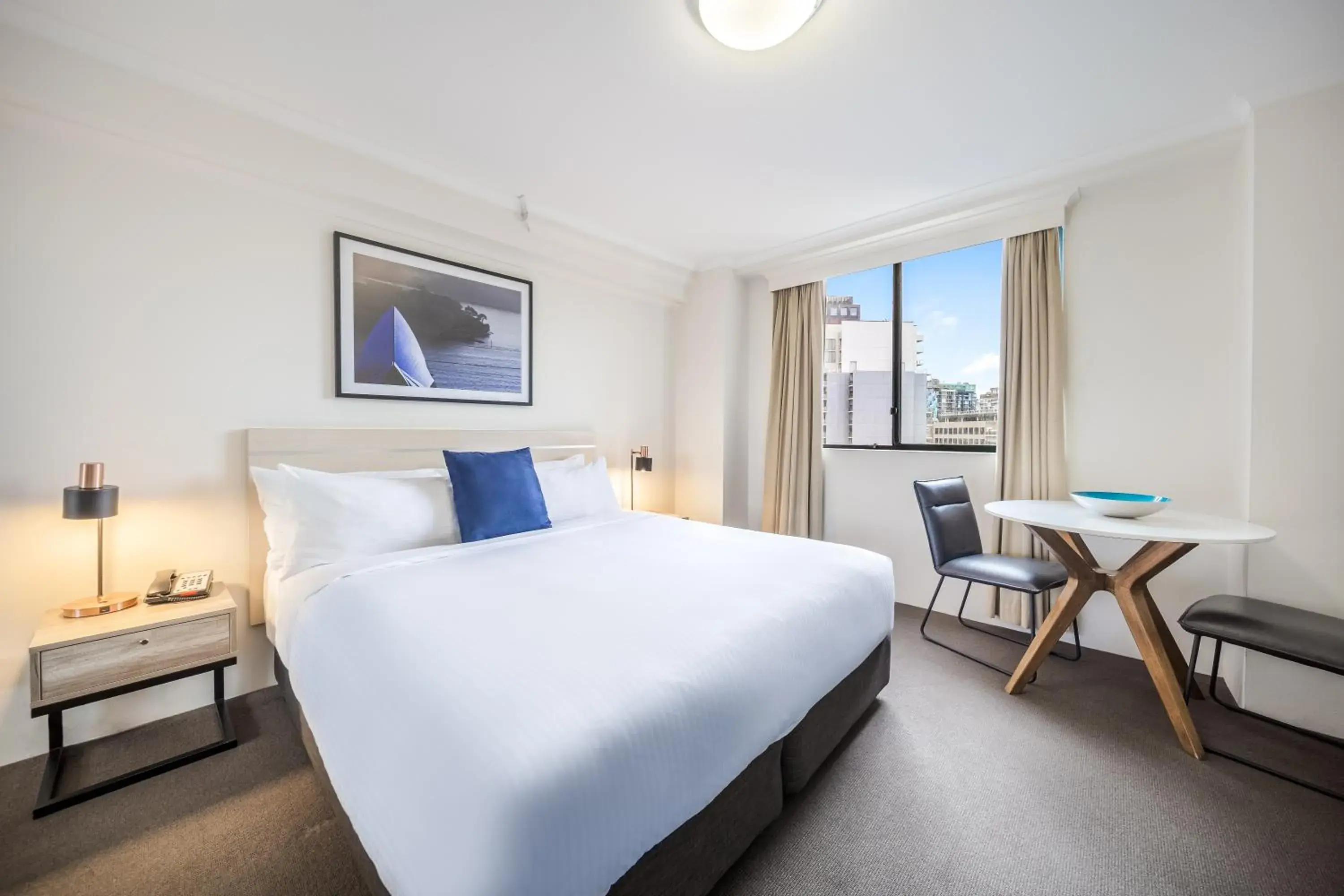 Bed in Oaks Sydney Castlereagh Suites