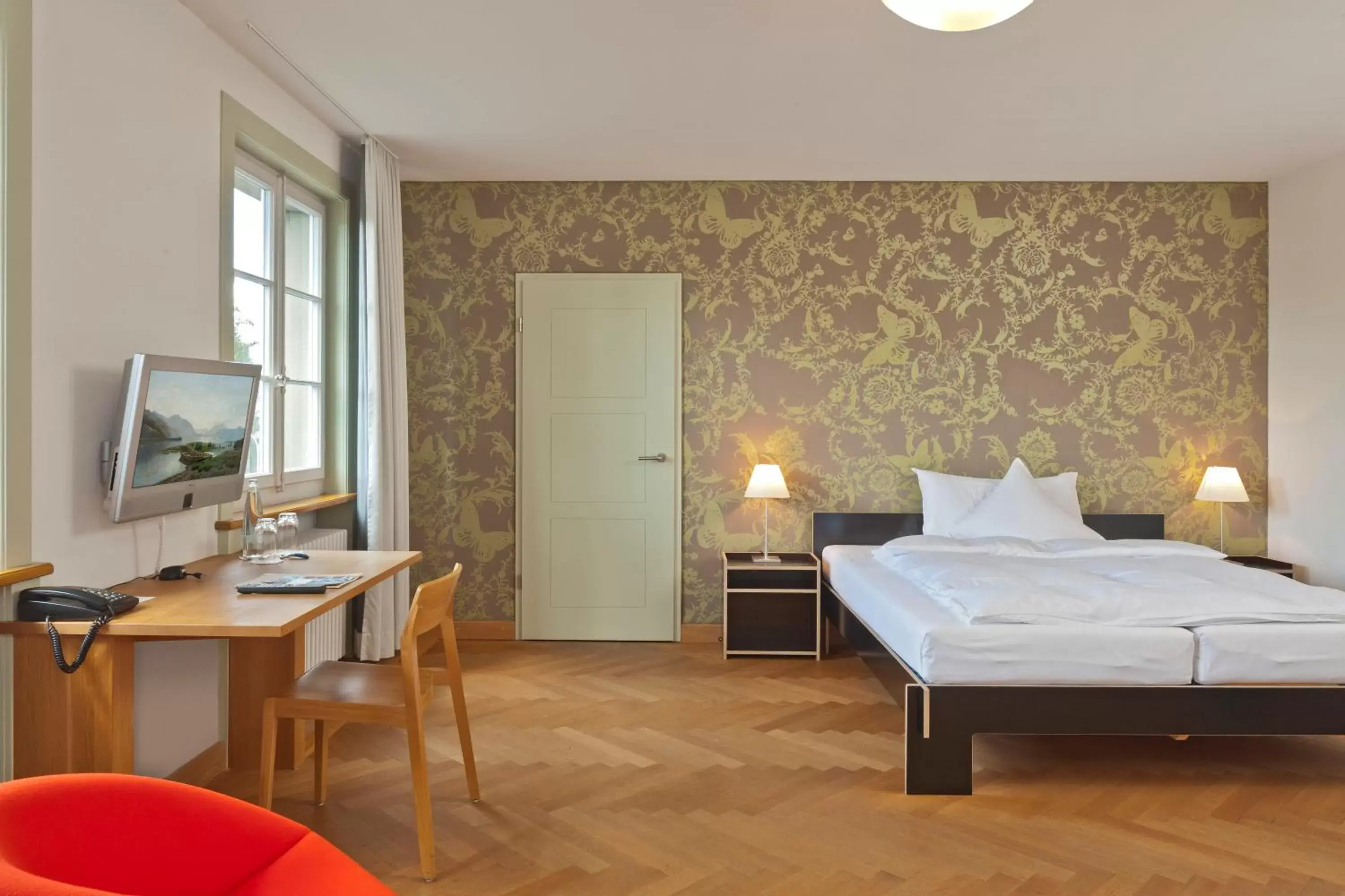 Photo of the whole room, Bed in Boutique-Hotel Auberge Langenthal