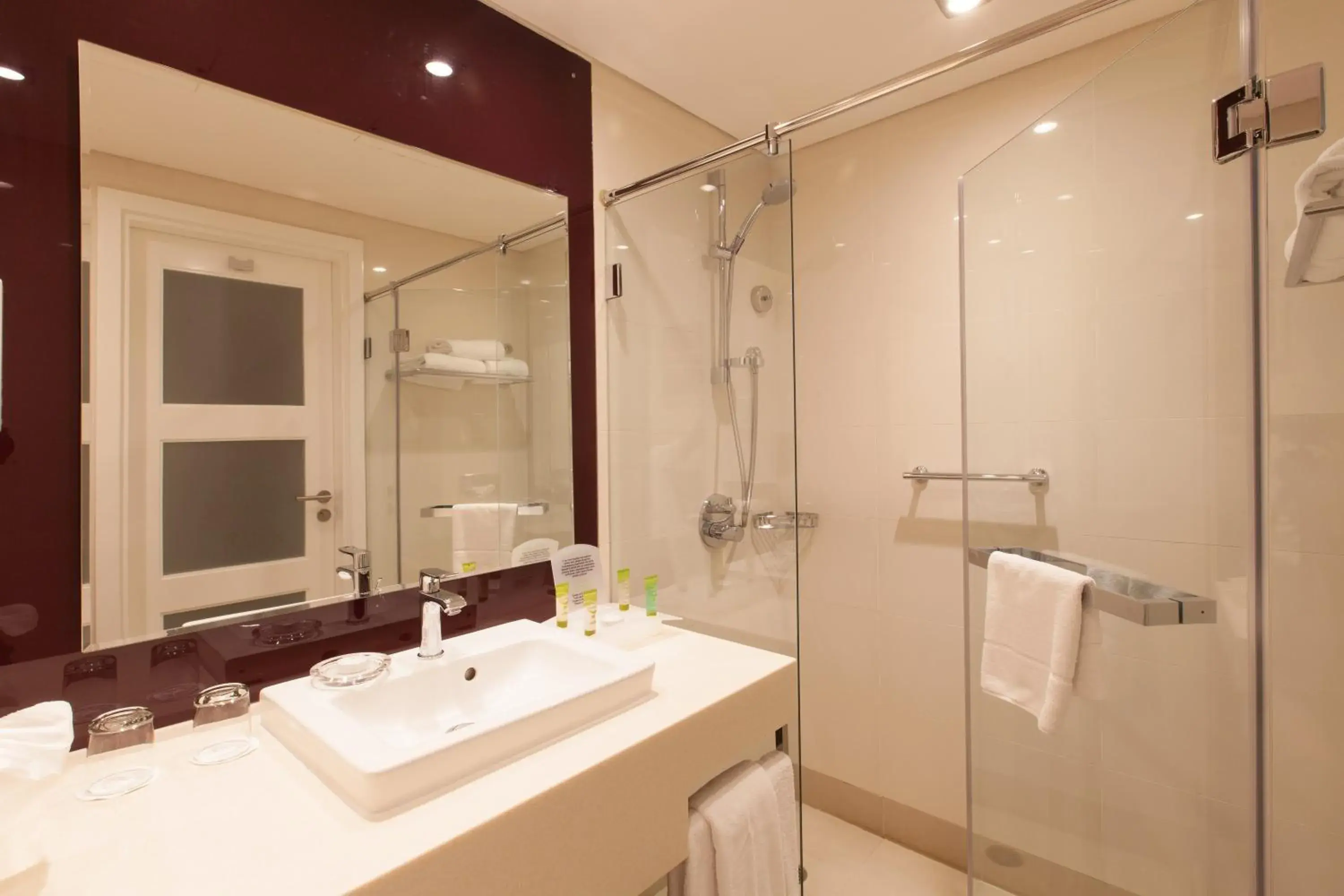 Bathroom in Holiday Inn Muscat AlSeeb by IHG Bathroom in Holiday Inn Muscat AlSeeb by IHG