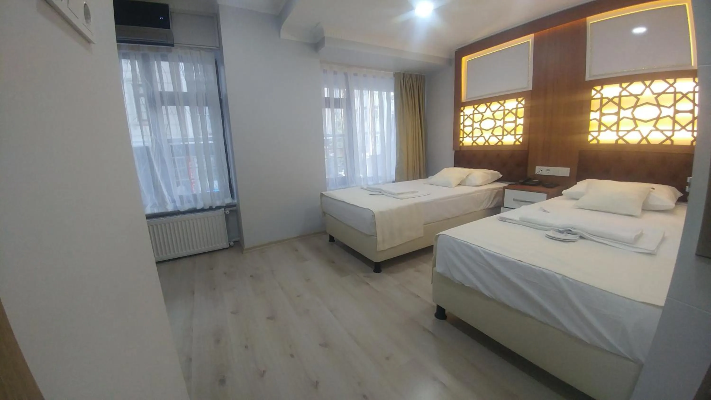 Photo of the whole room, Bed in Grand Liza Hotel