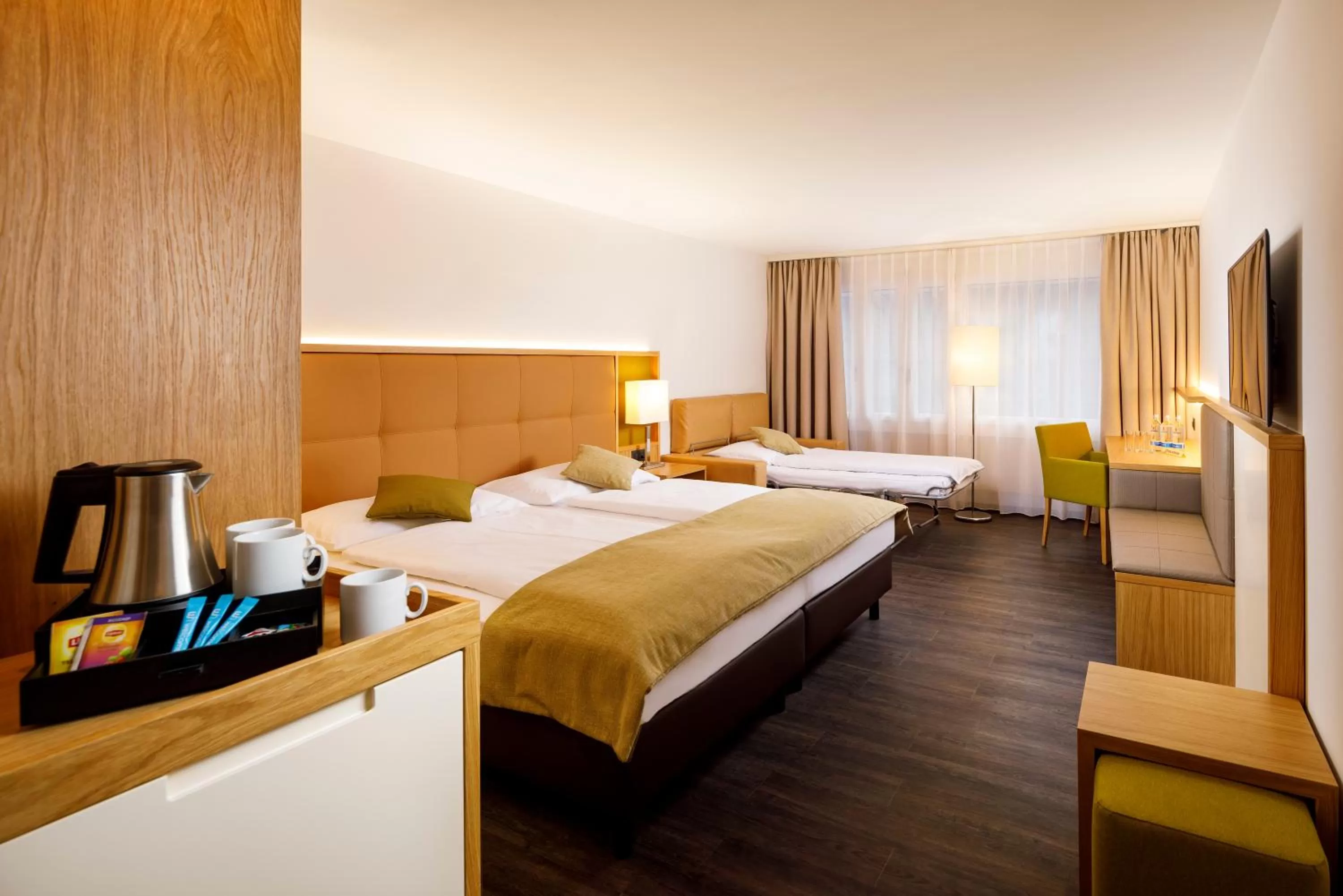 Photo of the whole room, Bed in Ramada by Wyndham Baden Hotel du Parc