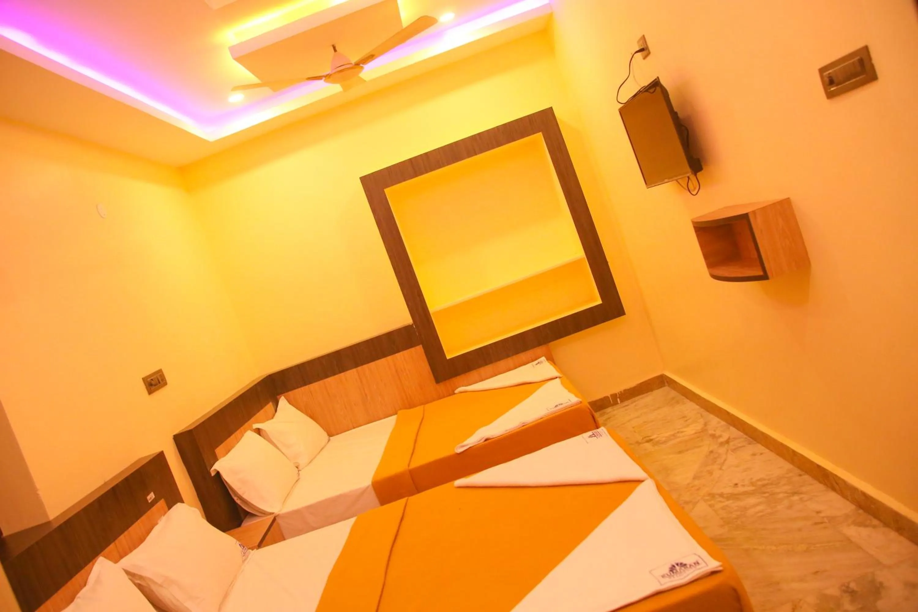 Photo of the whole room, Bed in SREE Kumaran Residence