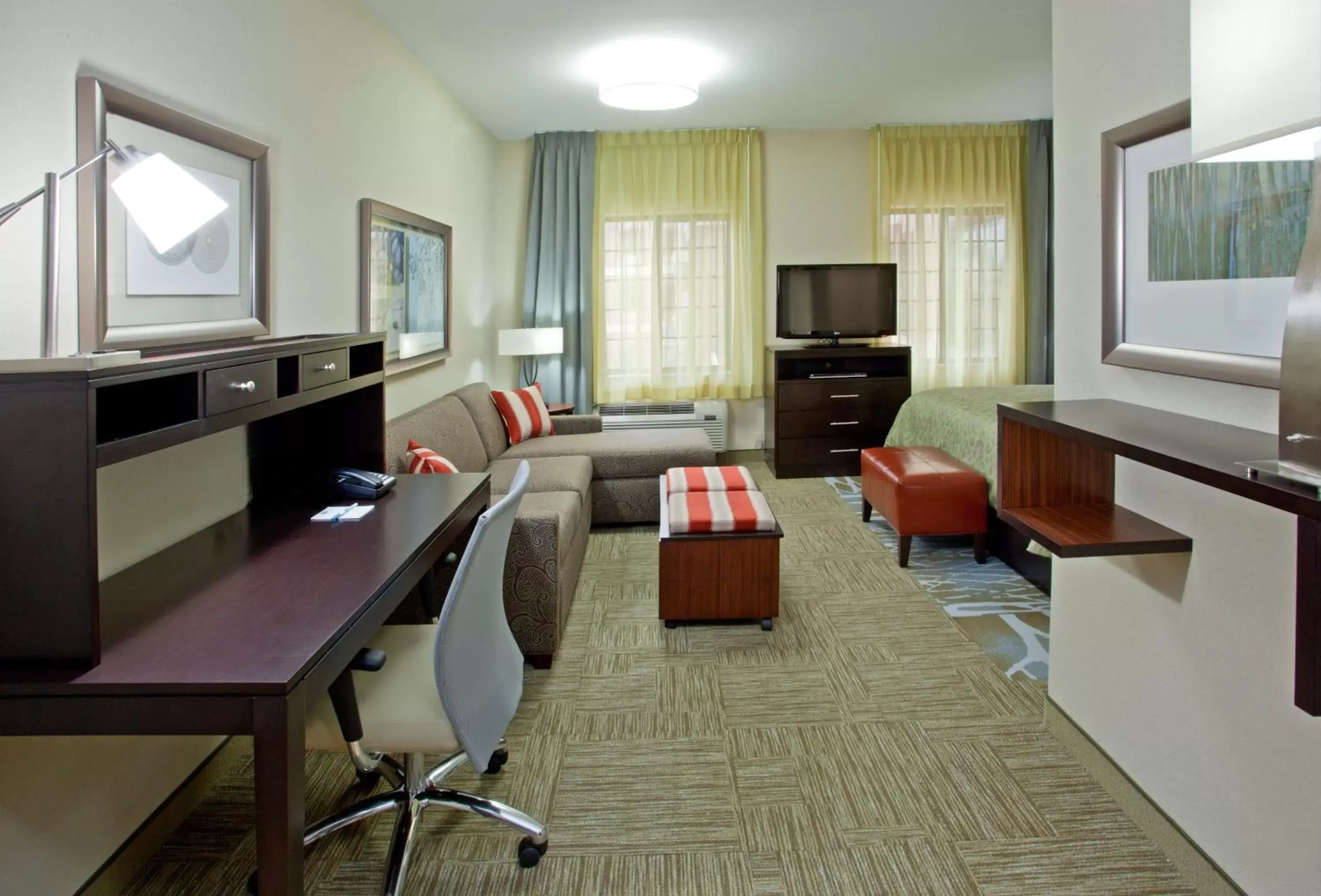 Photo of the whole room, Seating Area in Staybridge Suites Houston Stafford - Sugar Land, an IHG Hotel