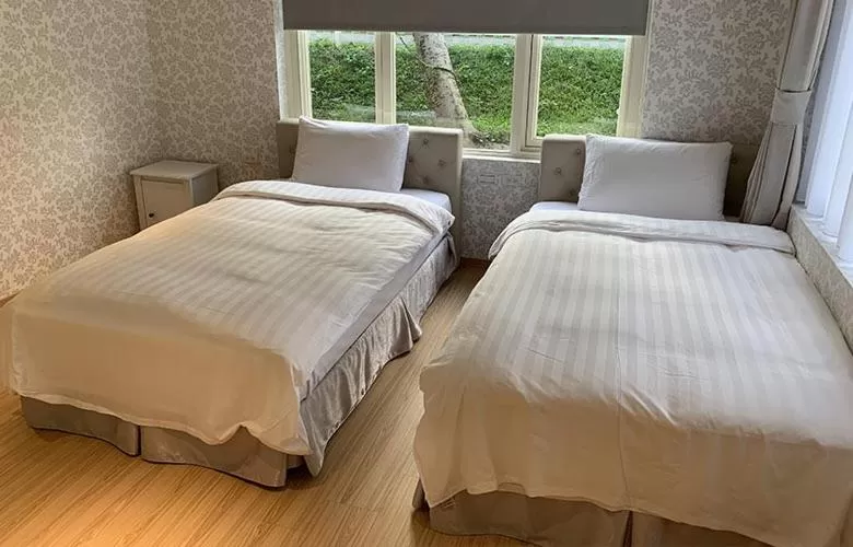 Bed in American Village Resort