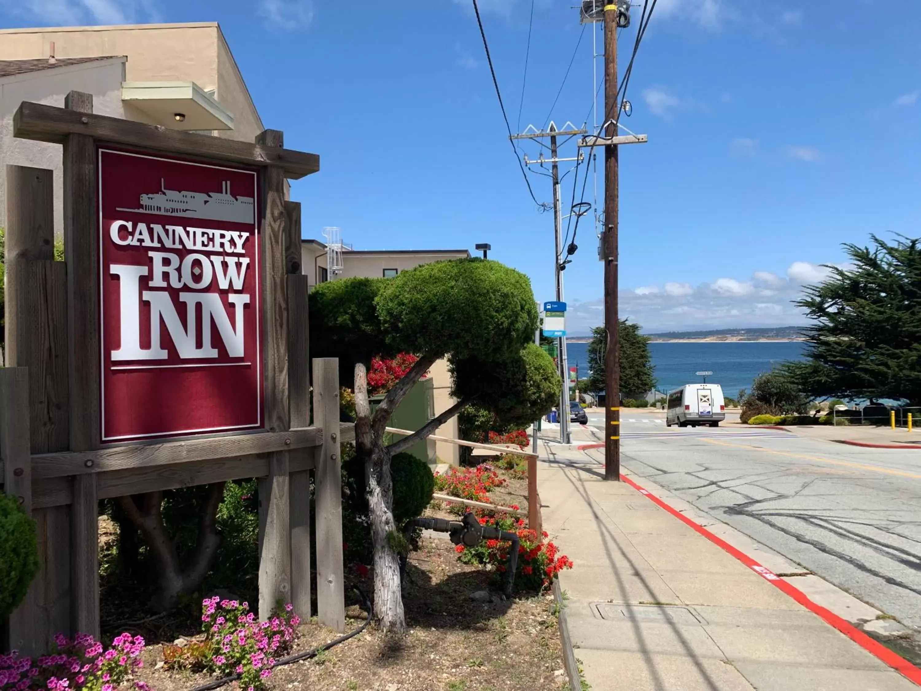 Property logo or sign in Cannery Row Inn