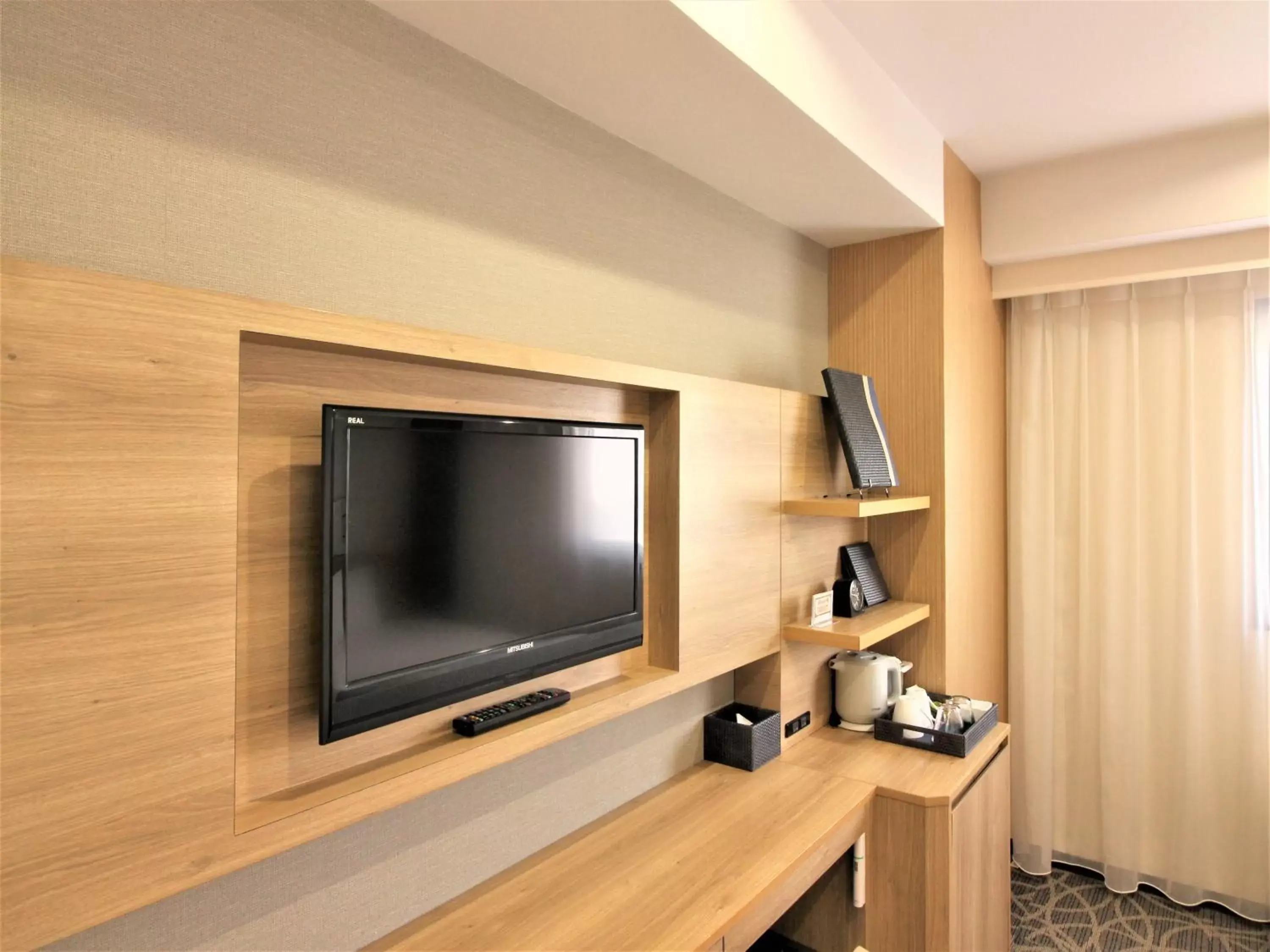 Photo of the whole room, TV/Entertainment Center in Hotel Hokke Club Naha Shintoshin