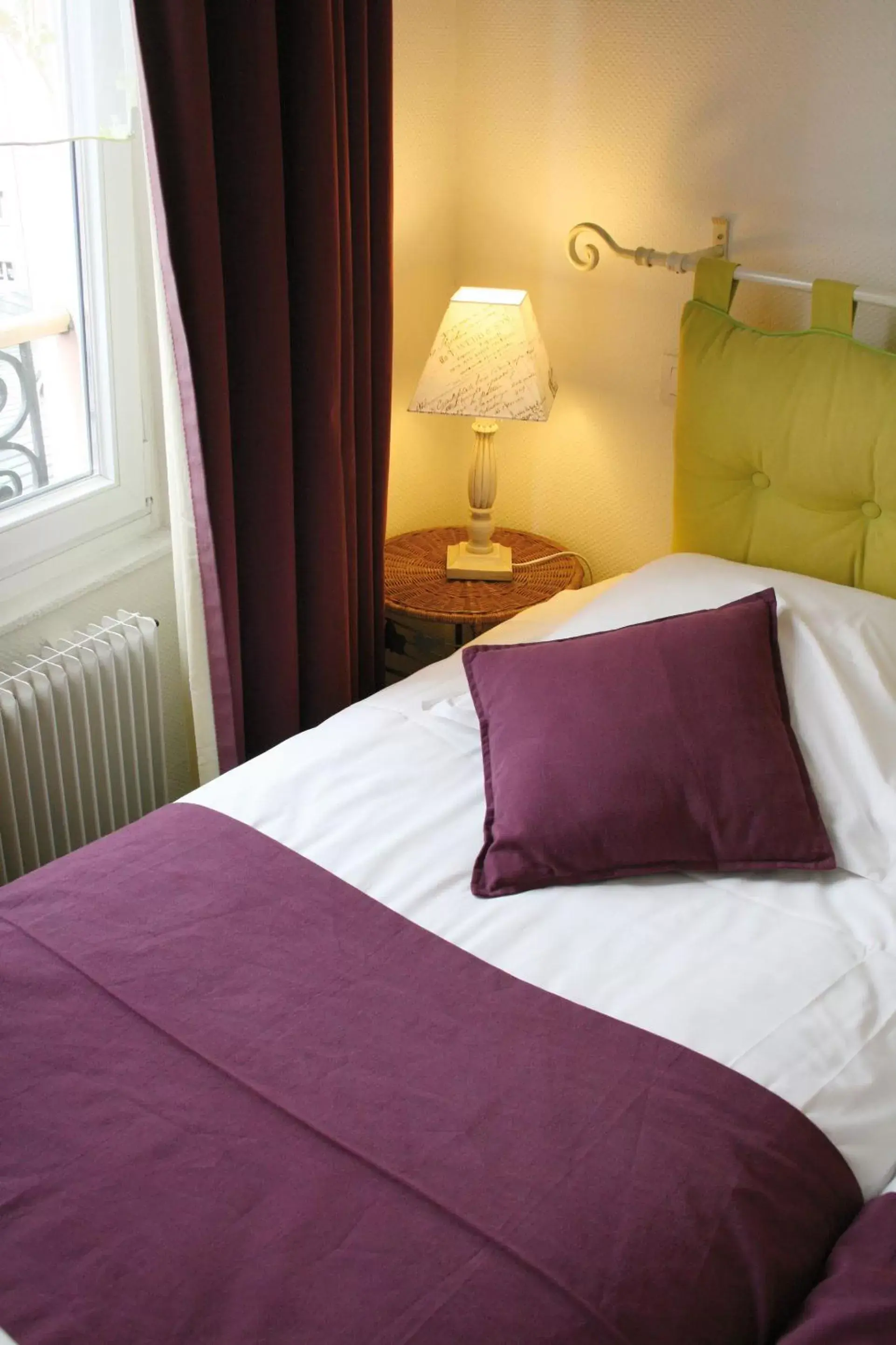 Bed in Le Kléber Hôtel