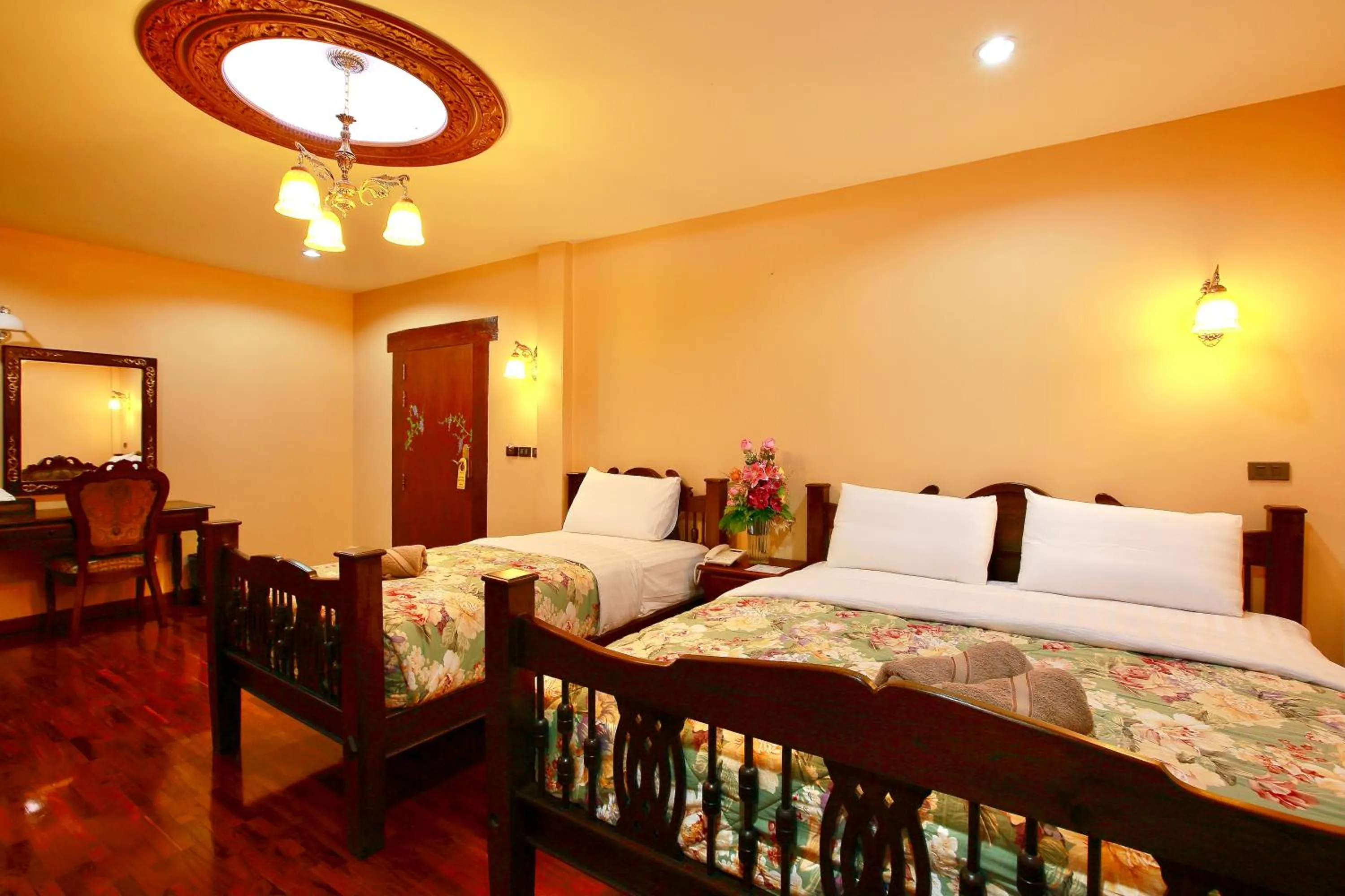 Photo of the whole room, Bed in At Chiang Mai Hotel